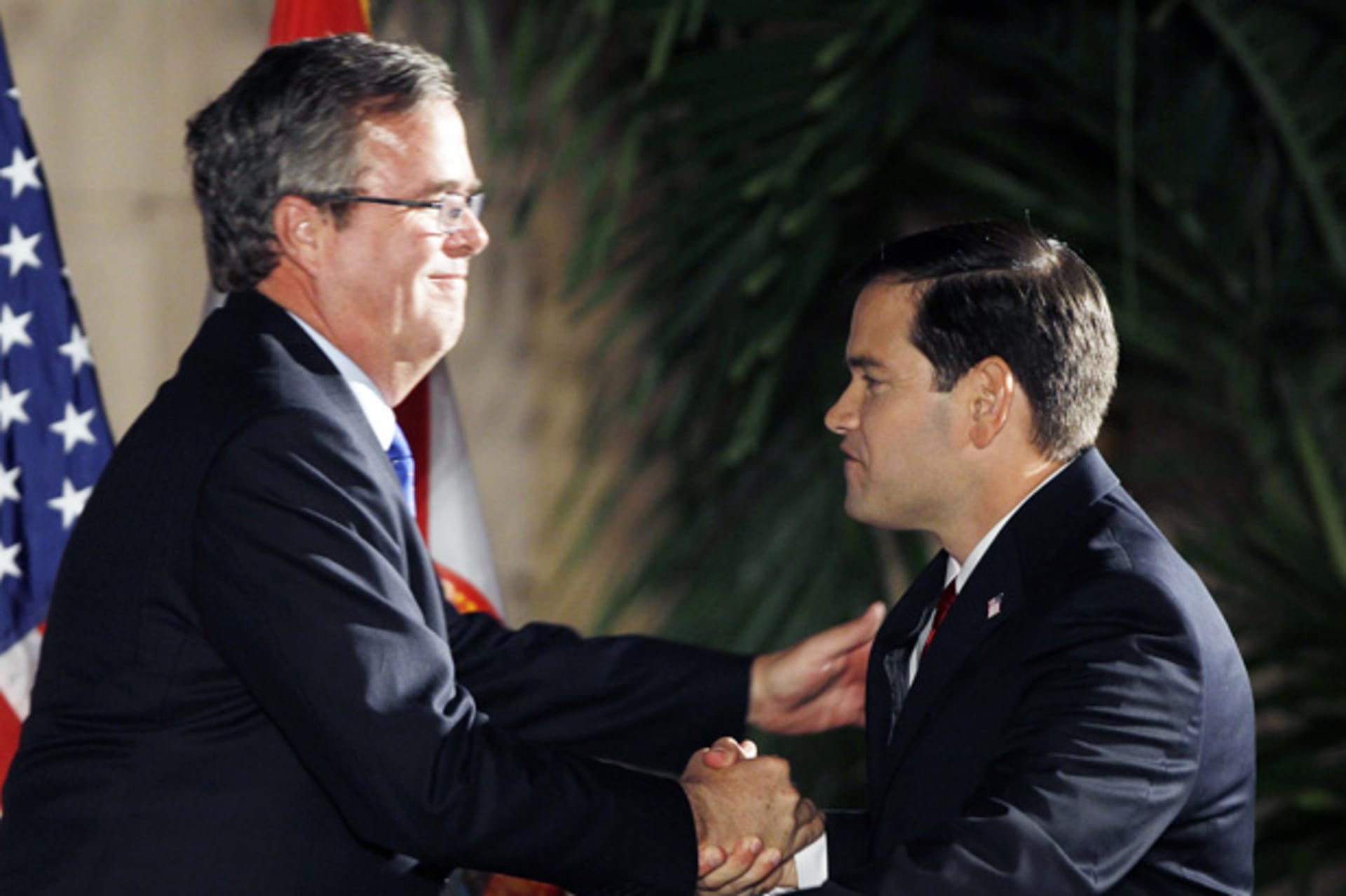 <p>Former Florida governor Jeb Bush shakes hands with then-U.S. Republican Senate candidate Marco Rubio in Coral Gables, Florida in November 2010 (Hans Deryk/Courtesy Reuters).</p>