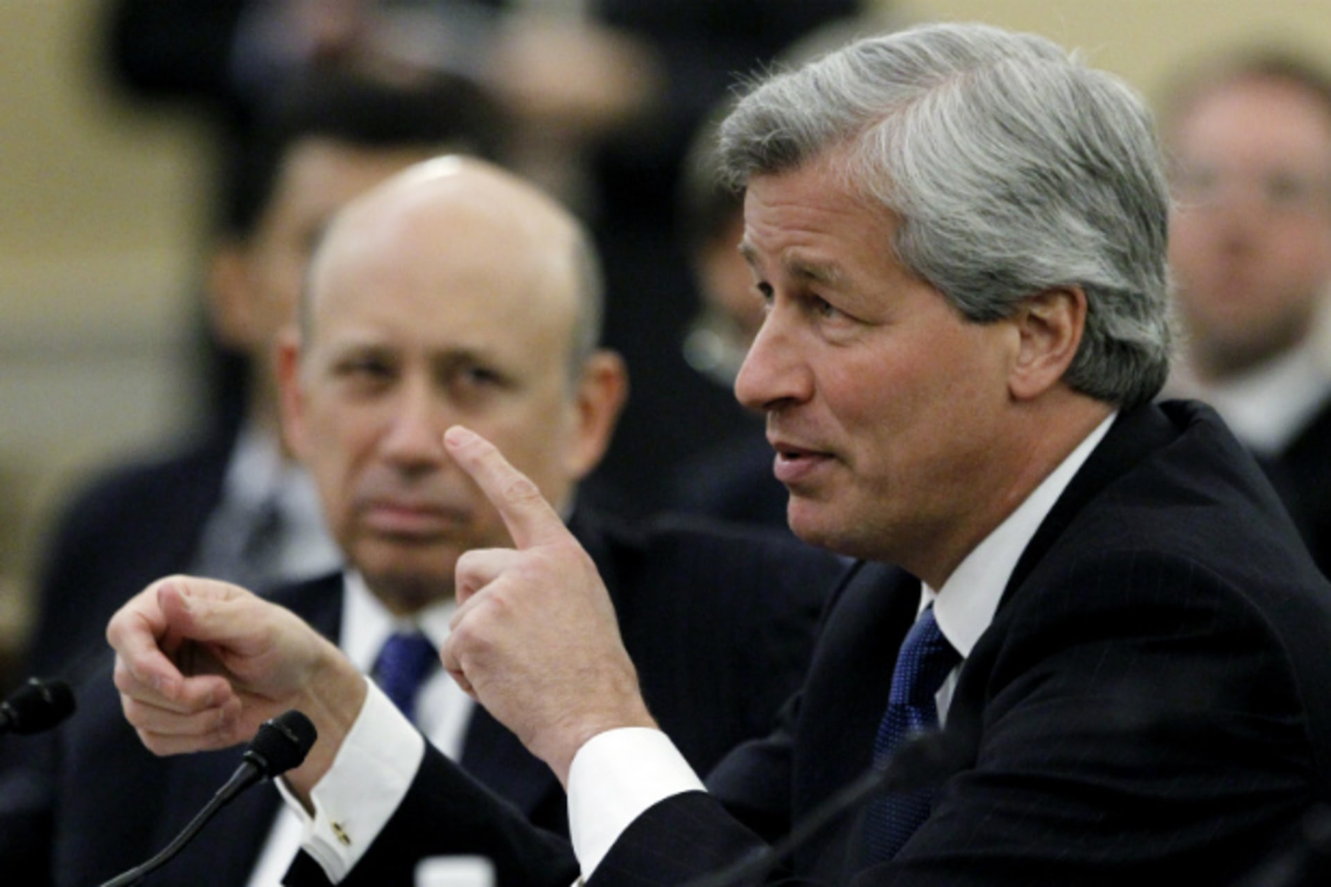 <p>JPMorgan Chase CEO Jamie Dimon testifies before the Congressional Financial Crisis Inquiry Commission, as Goldman Sachs CEO Lloyd Blankfein looks on in January 2010 (Kevin Lamarque/Courtesy Reuters).</p>
