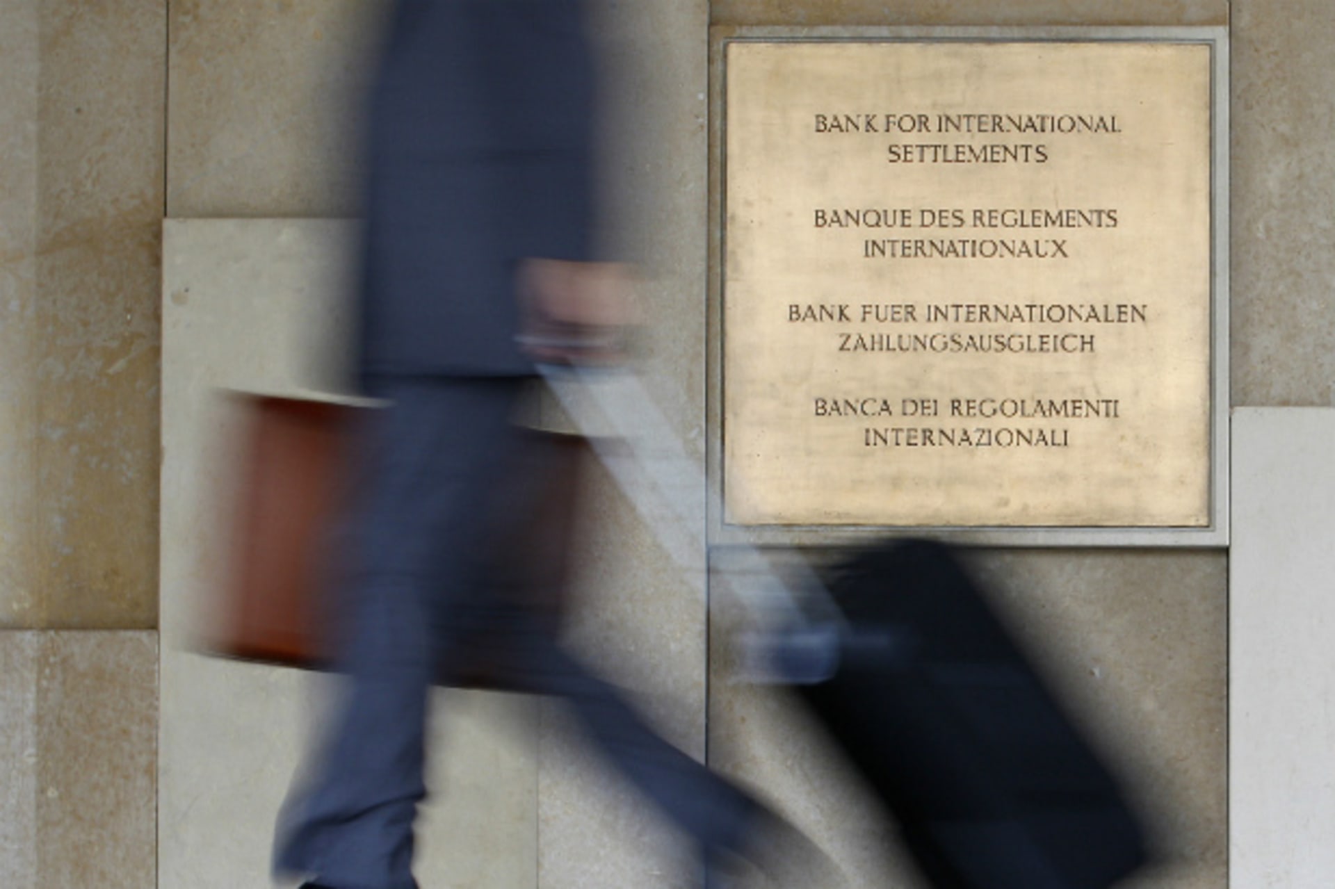 <p>A man enters the headquarters of the Bank for International Settlements, which sponsors the international Basel Committee on Banking Supervision that issued the Basel III rules (Christian Hartmann/Courtesy Reuters).</p>
