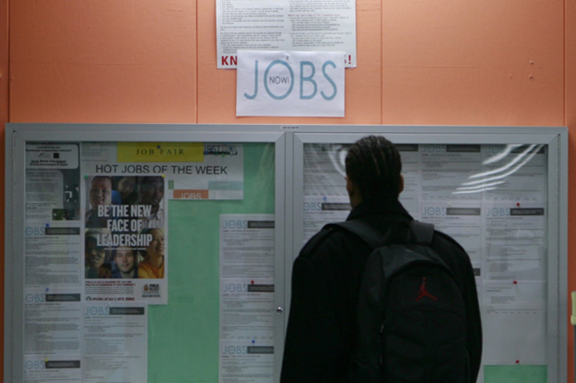 <p>A man looks at employment opportunities in San Francisco (Robert Galbraith/Courtesy Reuters).</p>
