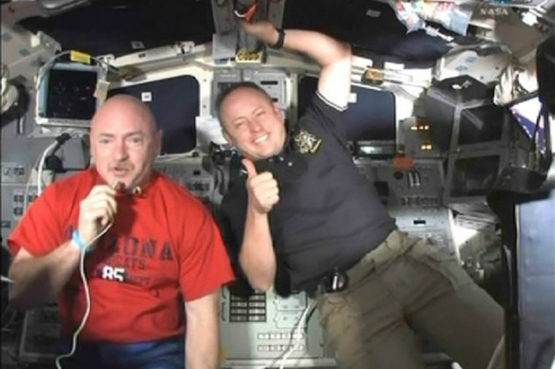 <p>Space Shuttle Endeavour Astronauts Mark Kelly and Mike Fincke talk to students at Mesa Verde Elementary School in Tucson, Arizona to spark interest in STEM studies in May 2011. (NASA Handout/Courtesy Reuters)</p>
