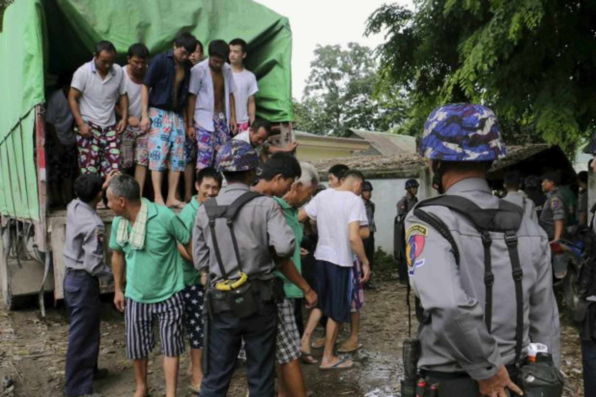<p>Chinese nationals, believed to be involved in illegal logging, arrive at a court in Myitkyina, capital of Kachin State in the … who declined to be identified as he was not authorized to speak to the media. Picture taken July 22, 2015. (Stringer/REUTERS)</p>
