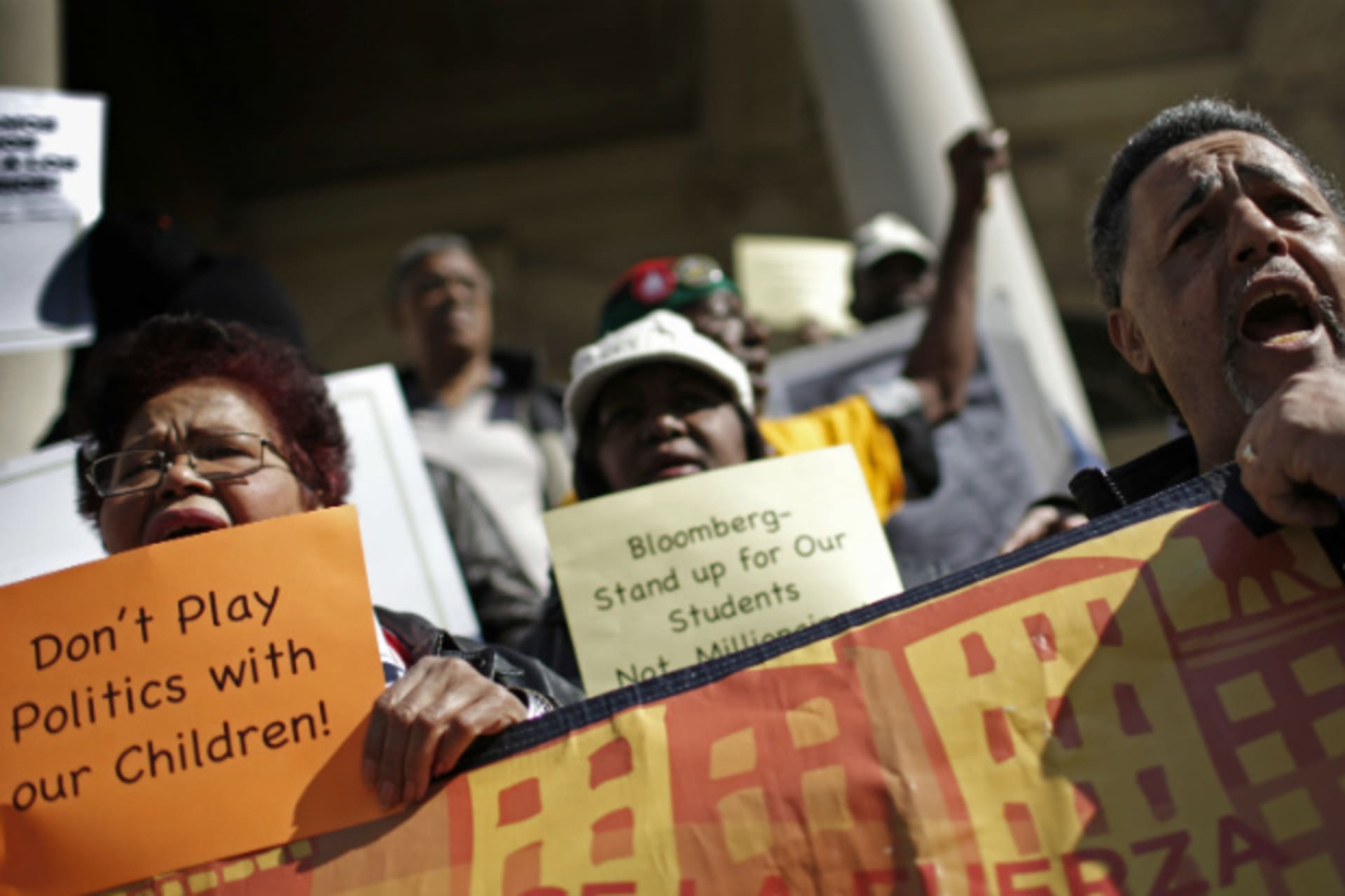 <p>Parents and education advocates demonstrate on the steps of New York’s City Hall for higher progressive taxes to close funding shortfalls in education. (Mike Segar/Courtesy Reuters)</p>
