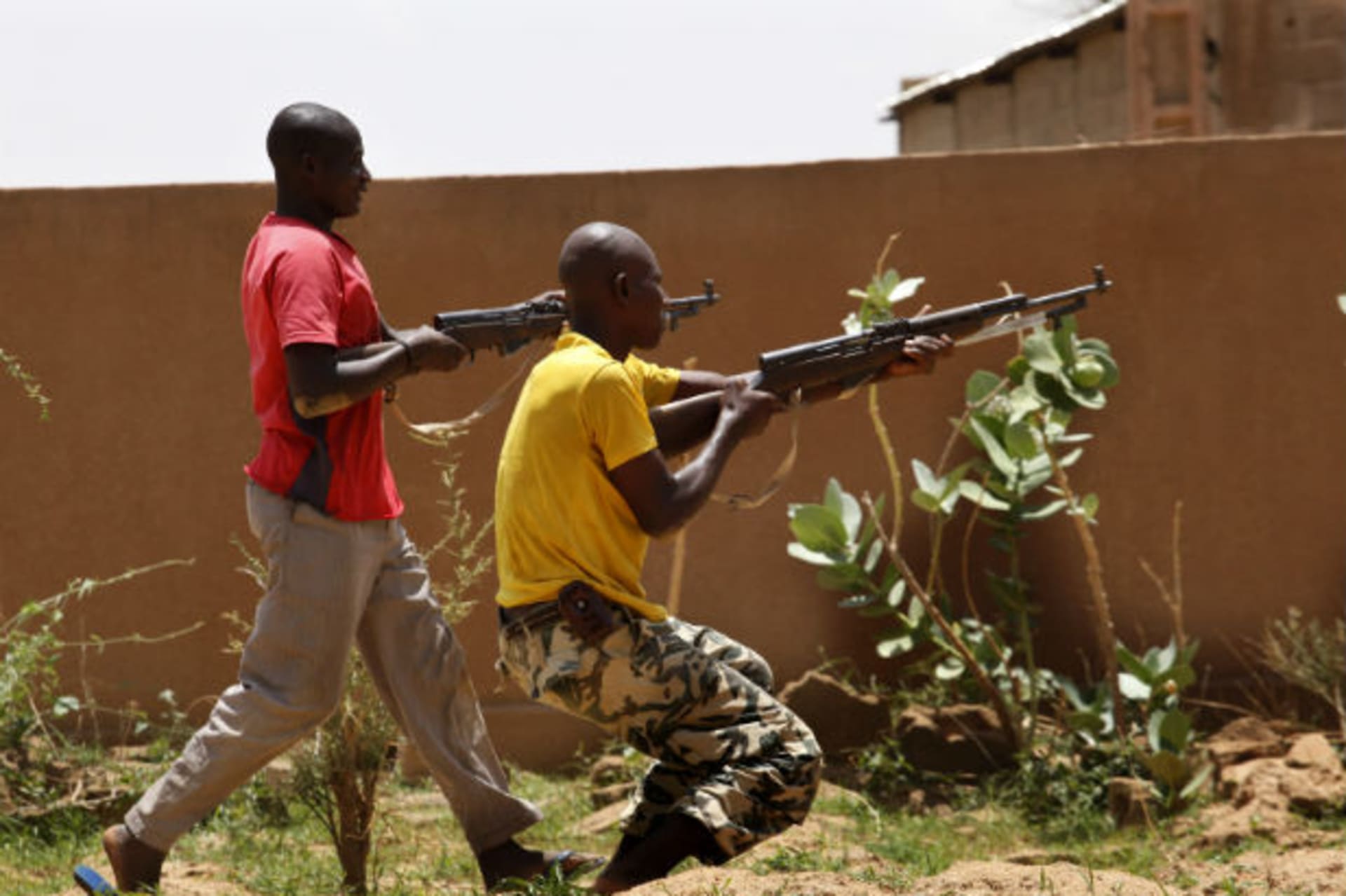 Members of a self-defense militia calling itself the FLN (Front for the Liberation of the North) train in Sevare, about 600 kms (400 miles) northeast of the capital Bamako, July 11, 2012.