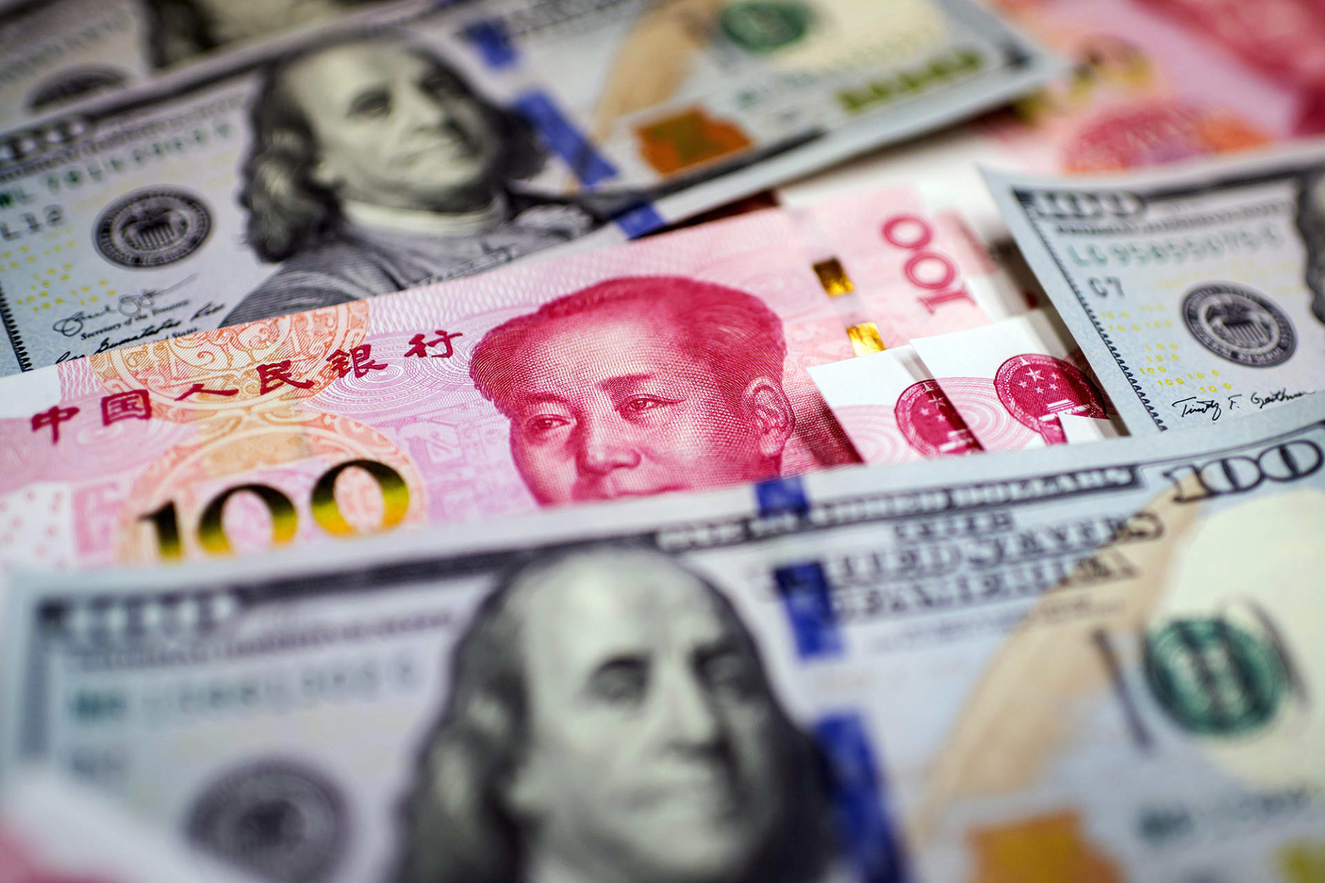<p>U.S. and Chinese Banknotes.</p>
