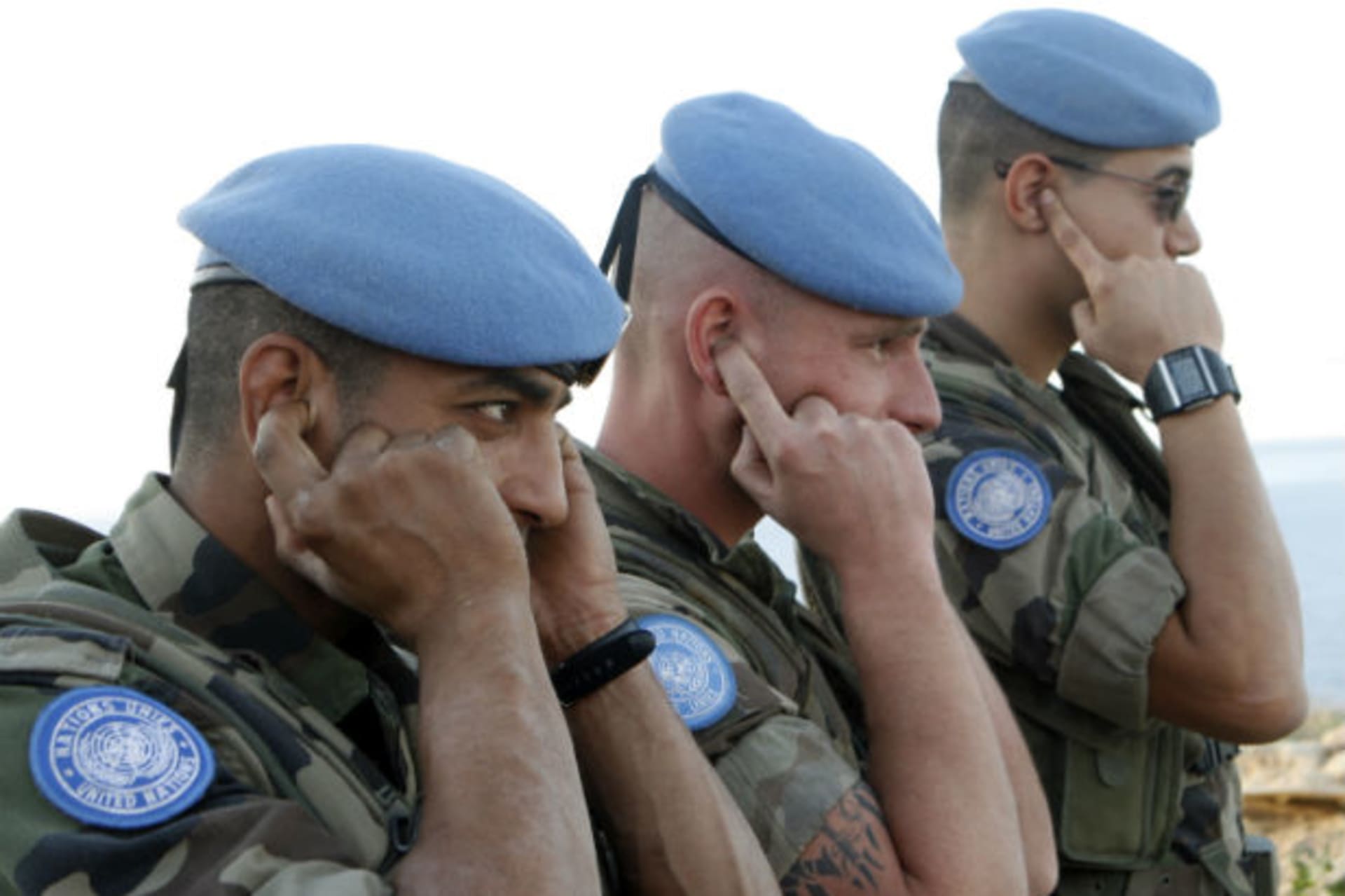 <p>French UN peacekeepers cover their ears during a live training exercise between the Lebanese army and UN peacekeepers in southern Lebanon in December 2008.</p>
