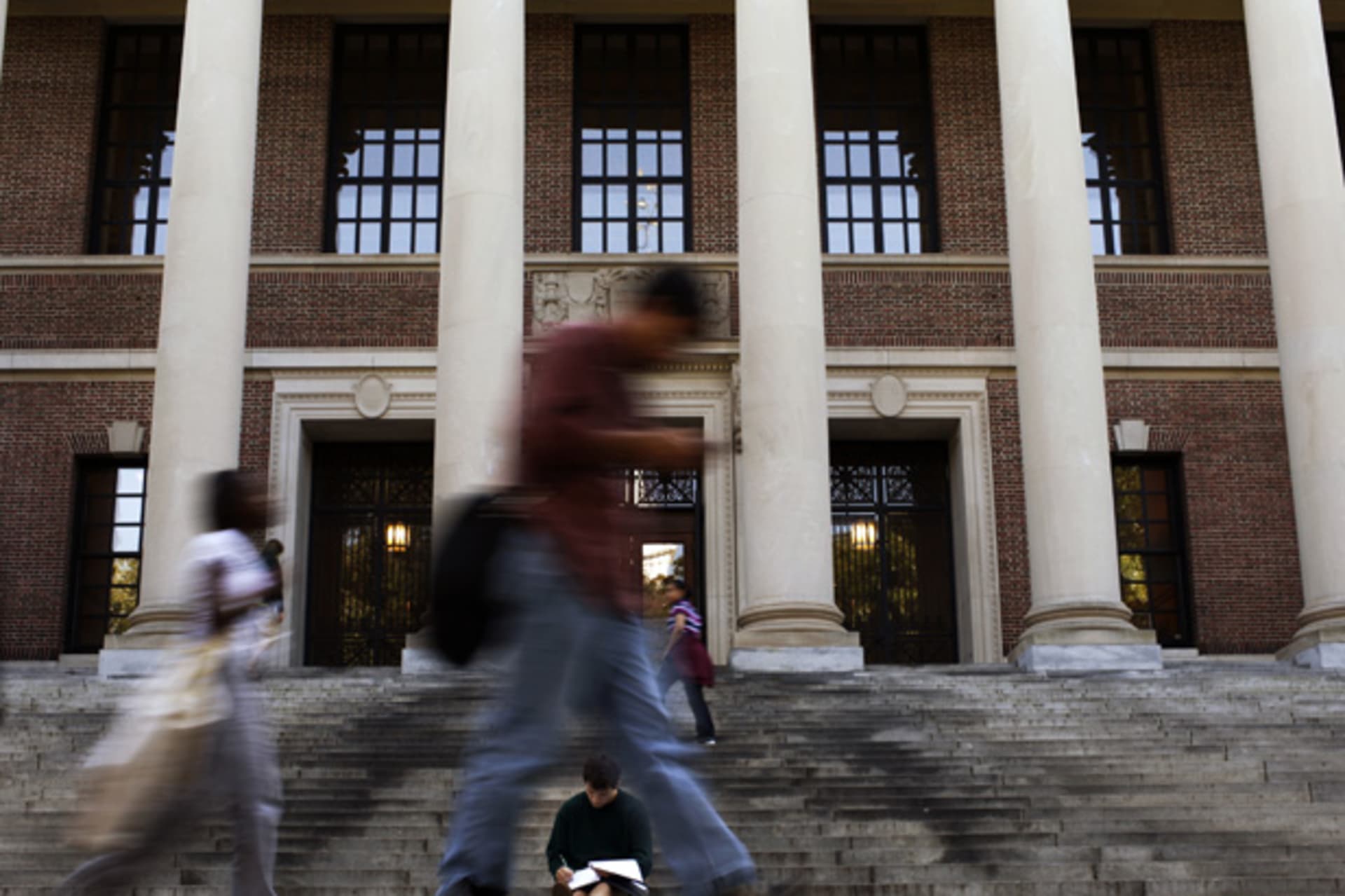 <p>Students outside of Widener Library at Harvard University, one of several universities now offering massive open online courses. (Brian Snyder/ courtesy Reuters)</p>
