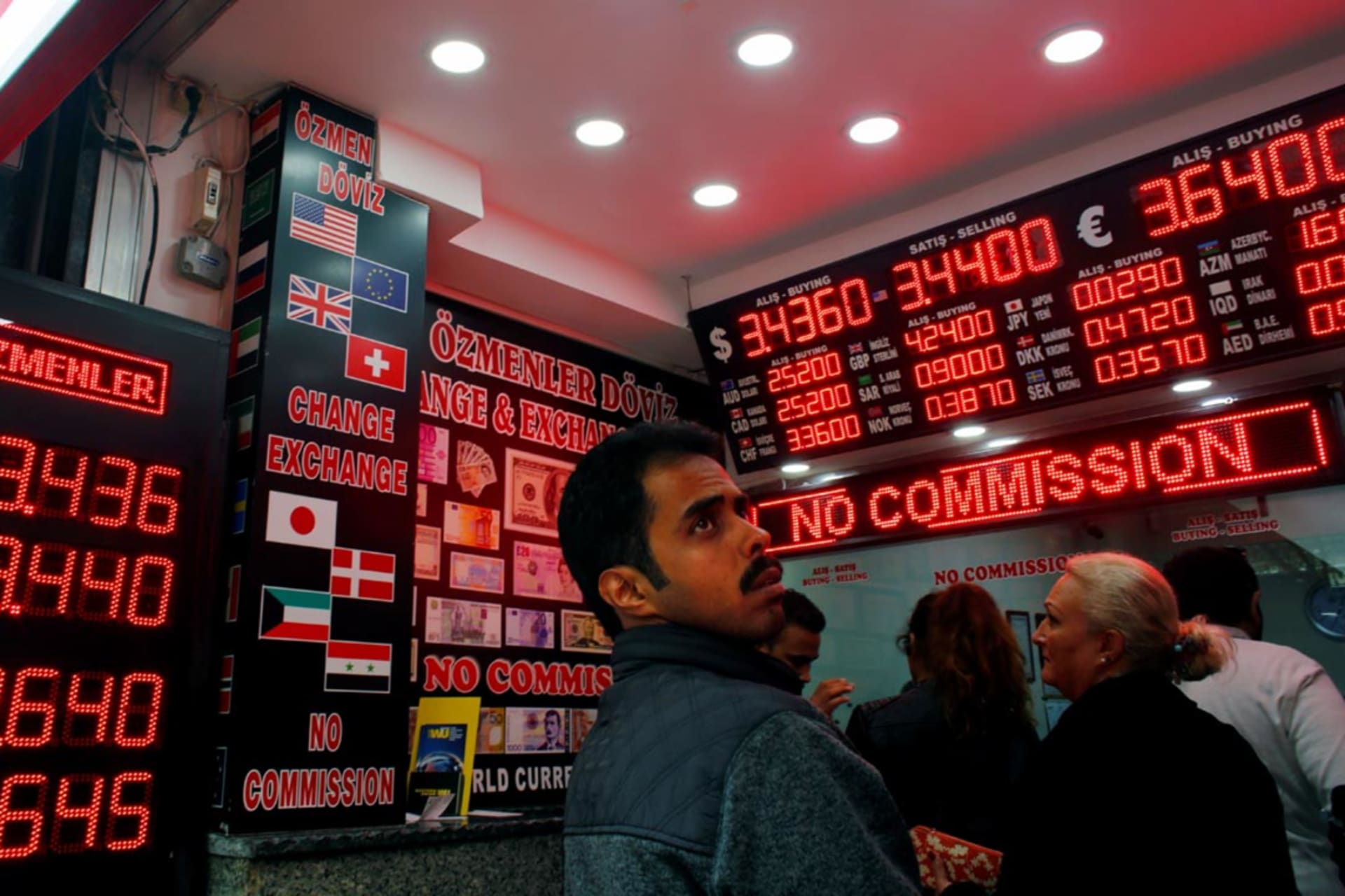 <p>Exchange rates on display at a currency exchange office in Istanbul, Turkey.</p>
