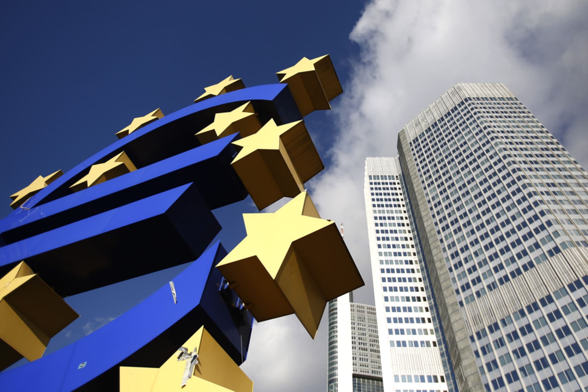 <p>A euro currency sign advertises the European Central Bank (ECB) headquarters in Frankfurt, Germany.</p>