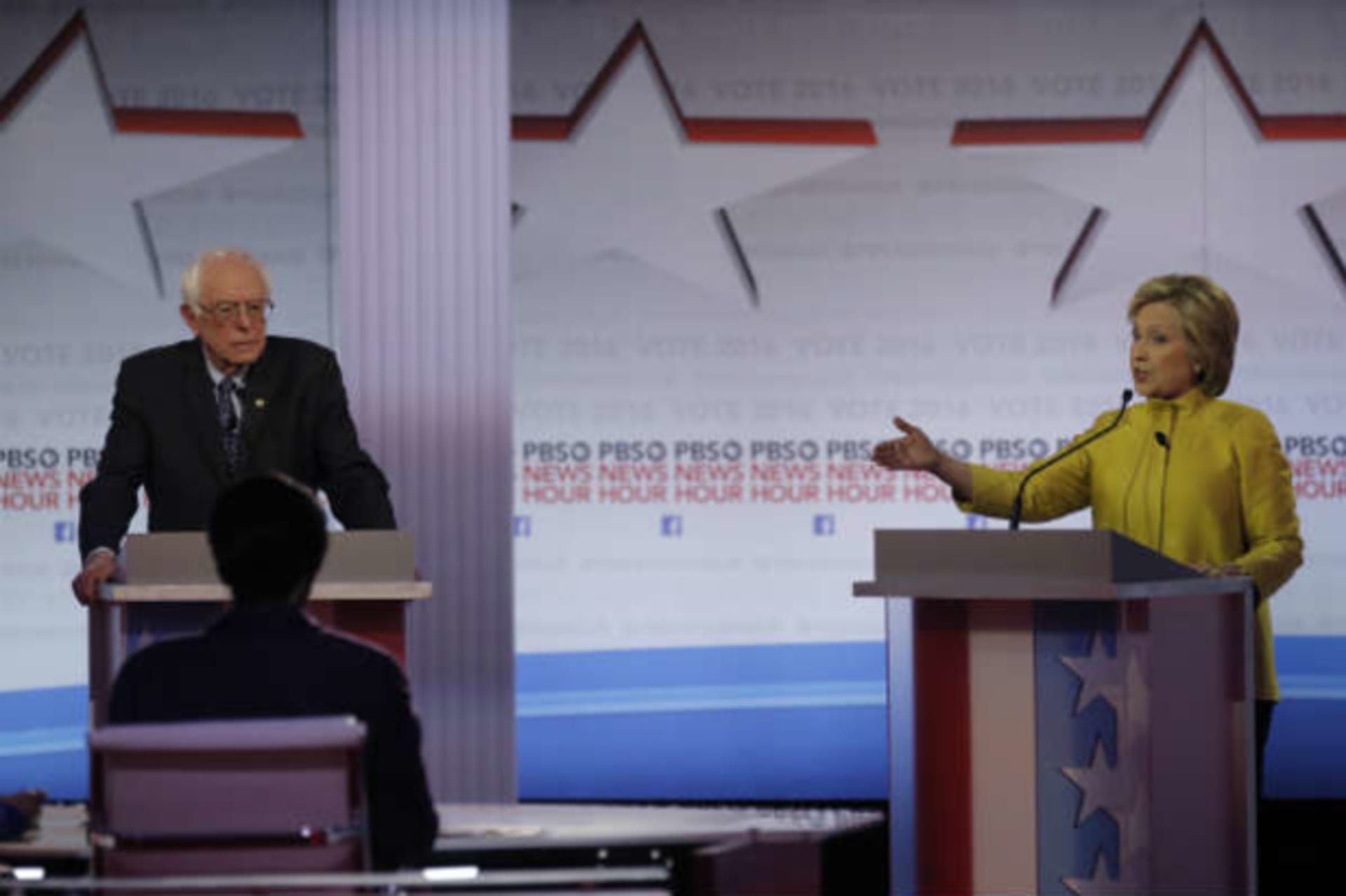 <p>Democratic presidential candidates Hillary Clinton and Bernie Sanders at the Democratic debate on February 11, 2016. (Jim Young/Reuters)</p>
