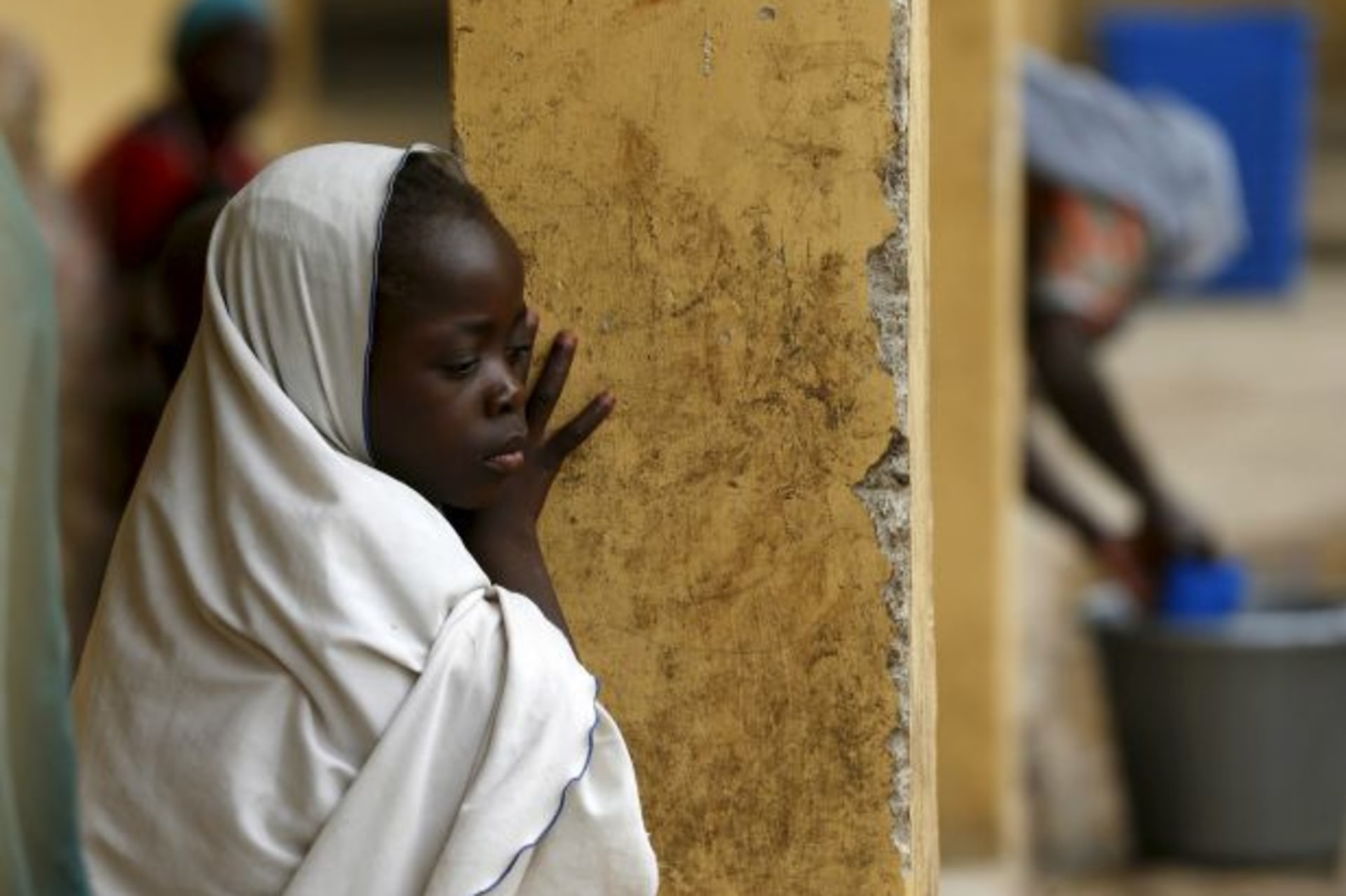 <p>Children rescued from Boko Haram in Sambisa forest react at a clinic at the internally displaced people’s camp in Yola, Nigeria, May 2015 (Afolabi Sotunde/Reuters).</p>
