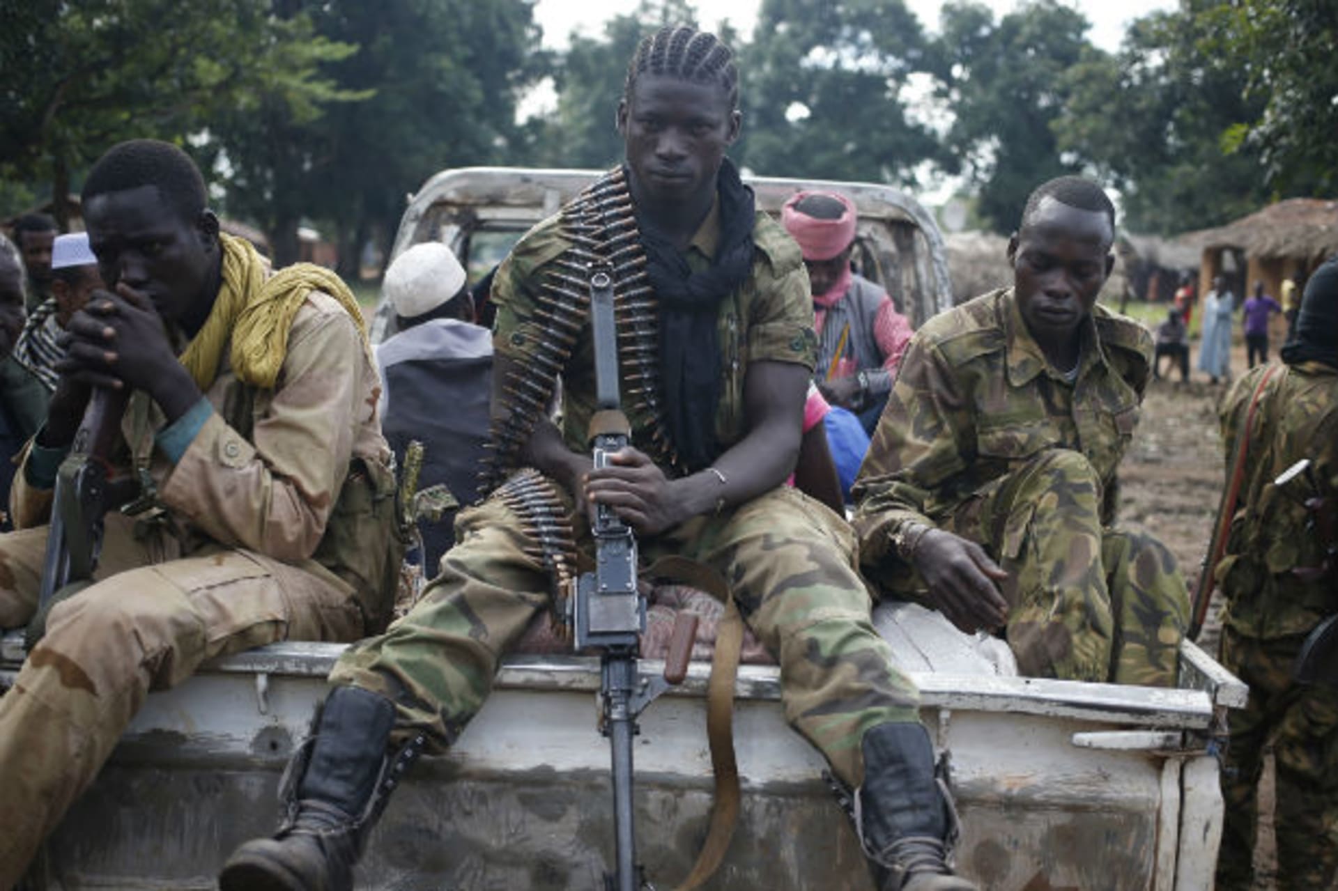 Seleka fighters take a break as they sit on a pick-up truck in the town of Goya, June 11, 2014.  (Goran Tomasevic/Courtesy Reuters)
