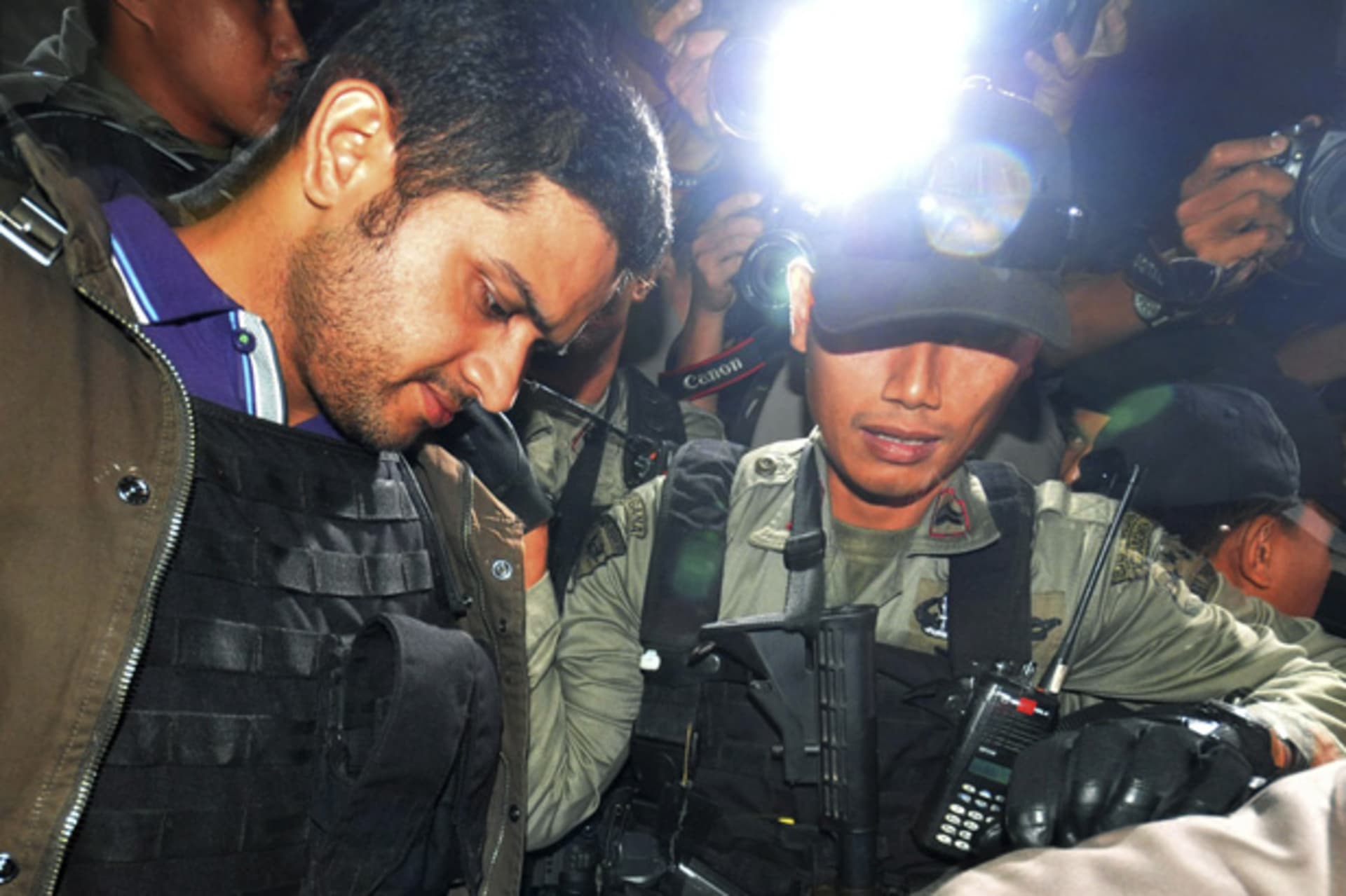 <p>Former Democratic Party treasurer Nazaruddin Muhammad, escorted by policemen, leaves the Corruption Eradication Commission office in Jakarta.</p>

