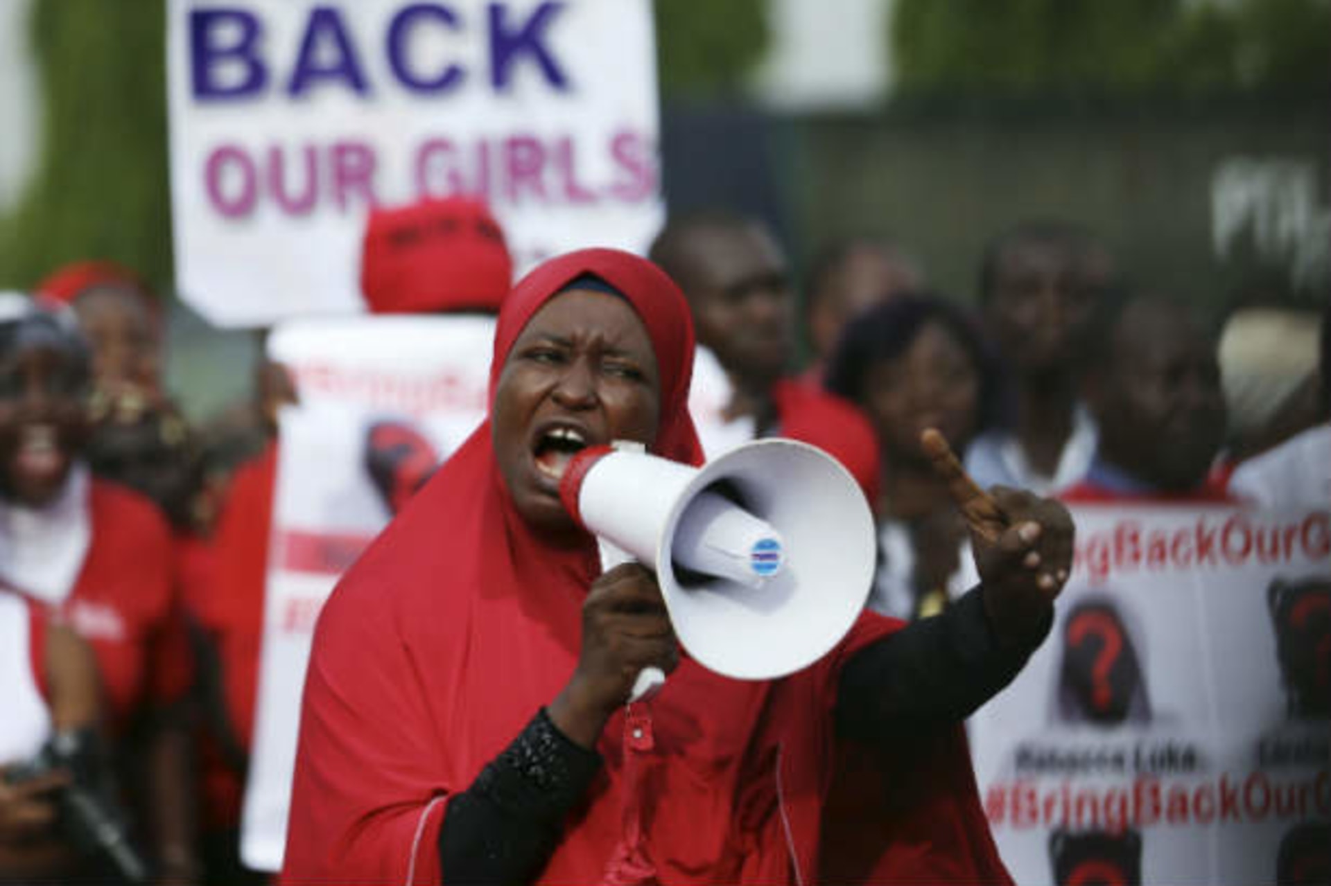 A protester addresses the "Bring Back Our Girls" protest group as they march to the presidential villa to deliver a protest letter to Nigeria's President Goodluck Jonathan in Abuja, calling for the release of the Nigerian schoolgirls in Chibok