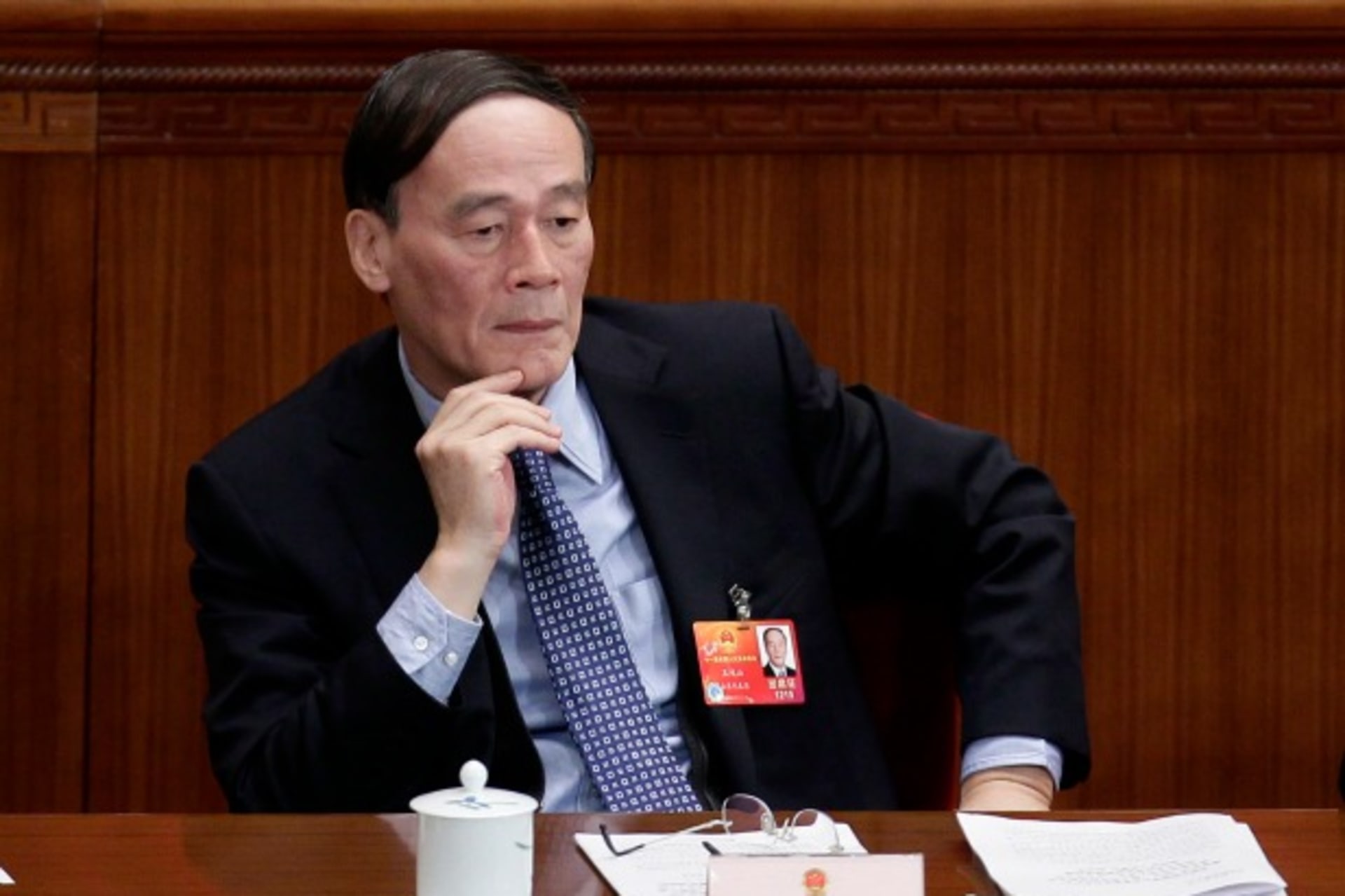 <p>Wang Qishan, now China’s anti-corruption chief, attends a plenary meeting of the National People’s Congress at the Great Hall of the People in Beijing on March 8, 2012.</p>
