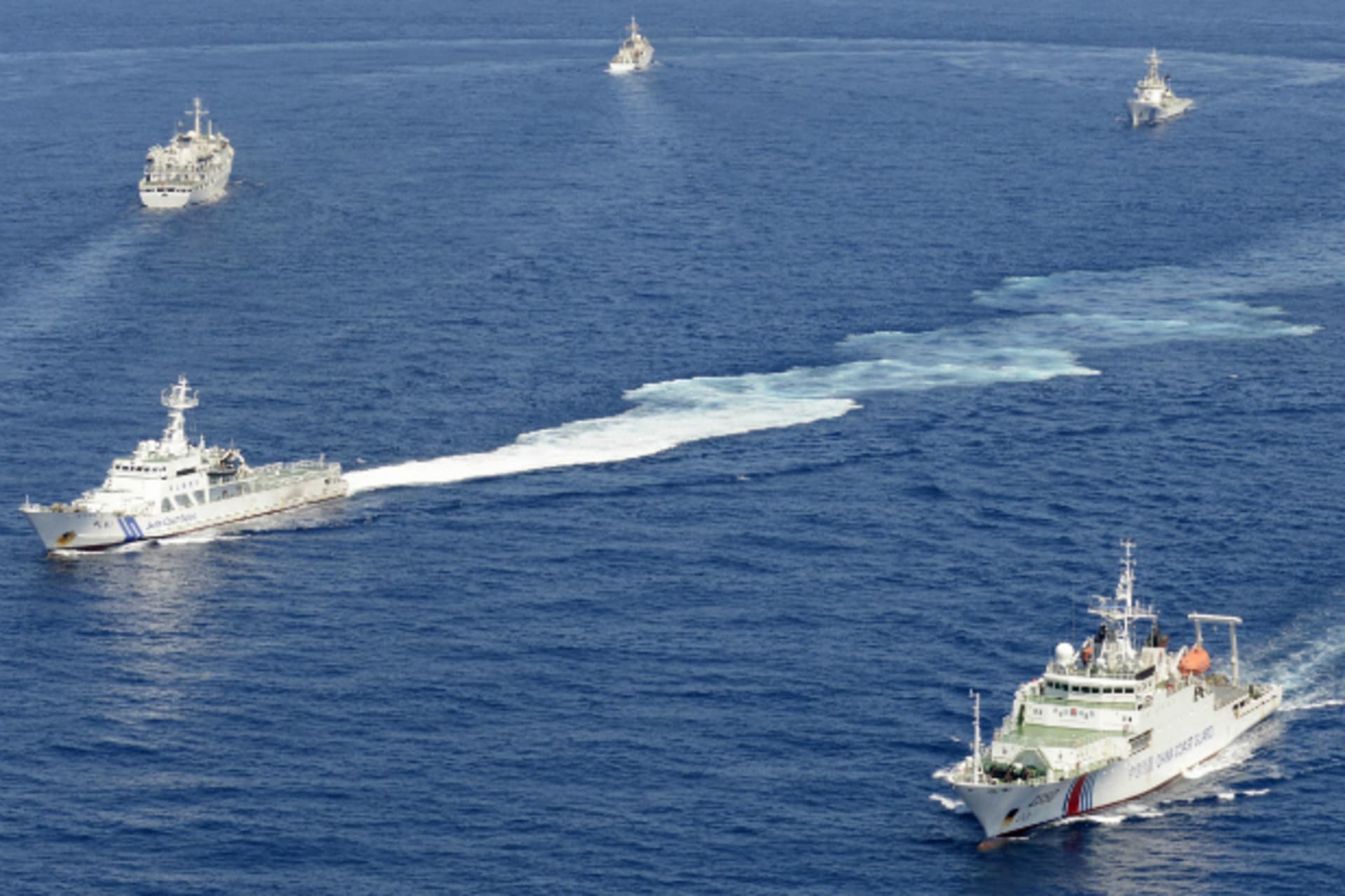 <p>Vessels from the China Maritime Surveillance and the Japan Coast Guard are seen near disputed islands, called Senkaku in Japan and Diaoyu in China, in the East China Sea, in this photo taken on September 10, 2013. (Kyodo/Courtesy Reuters)</p>