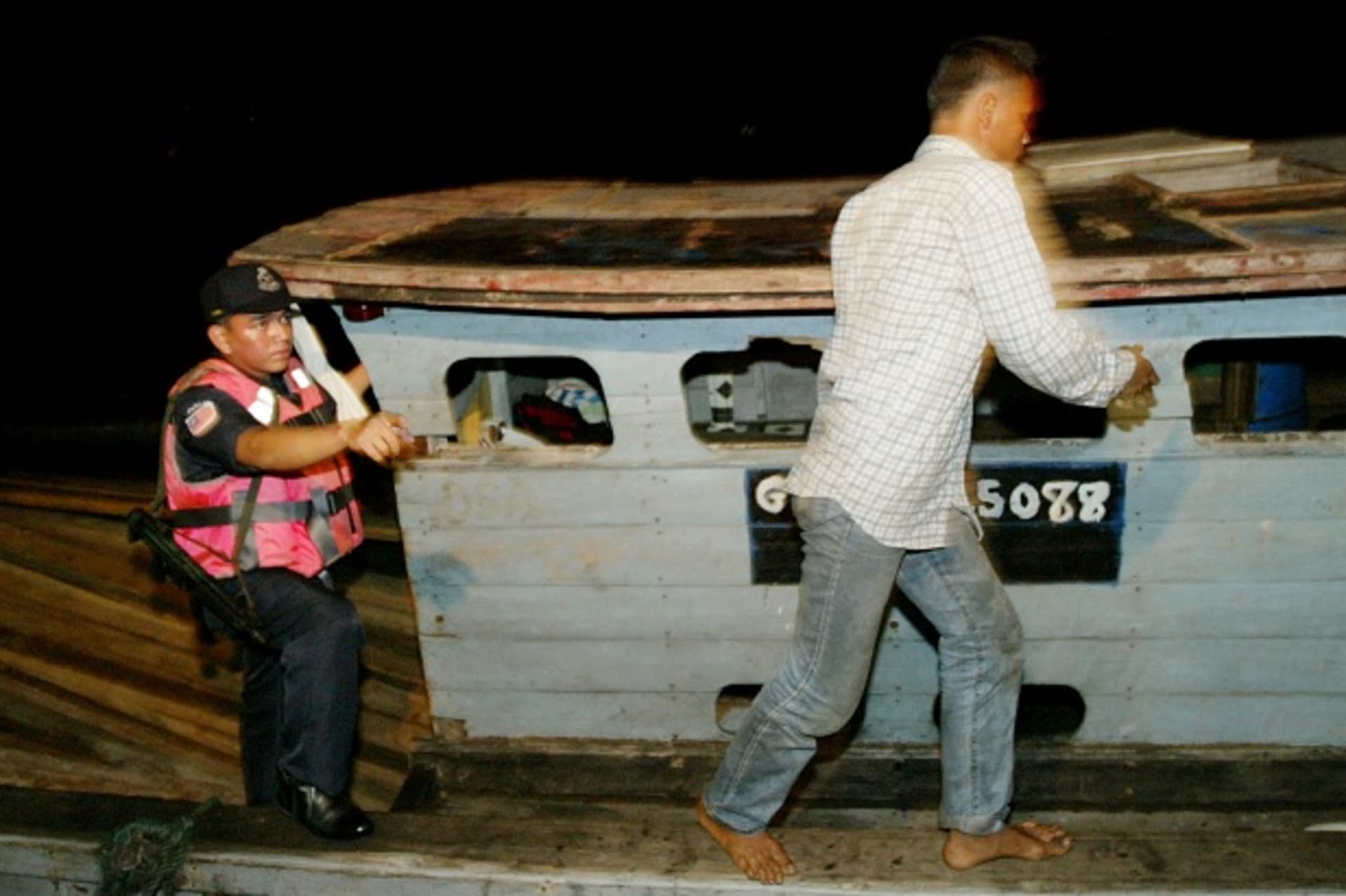 TO ACCOMPANY FEATURE CRIME-MALAYSIA-STRAIT.