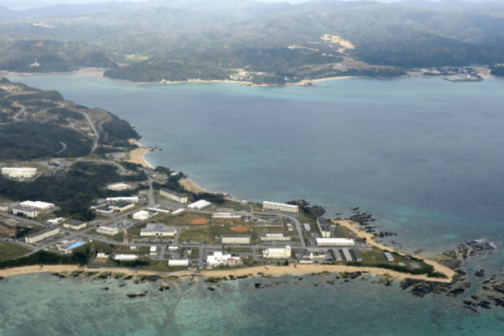<p>Coral reefs are seen along the coast near the U.S. Marine base Camp Schwab, off the tiny hamlet of Henoko in Nago on the southern Japanese island of Okinawa, in this aerial photo taken by Kyodo on January 14, 2014. (Kyodo/Courtesy Reuters)</p>