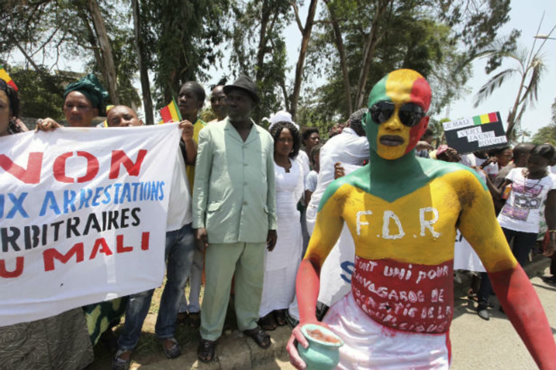Citizens of Mali protest during the Economic Community of West African States (ECOWAS) meeting, where the Mali crisis and Guinea-Bissau coup are discussed, in Abidjan April 26, 2012.
