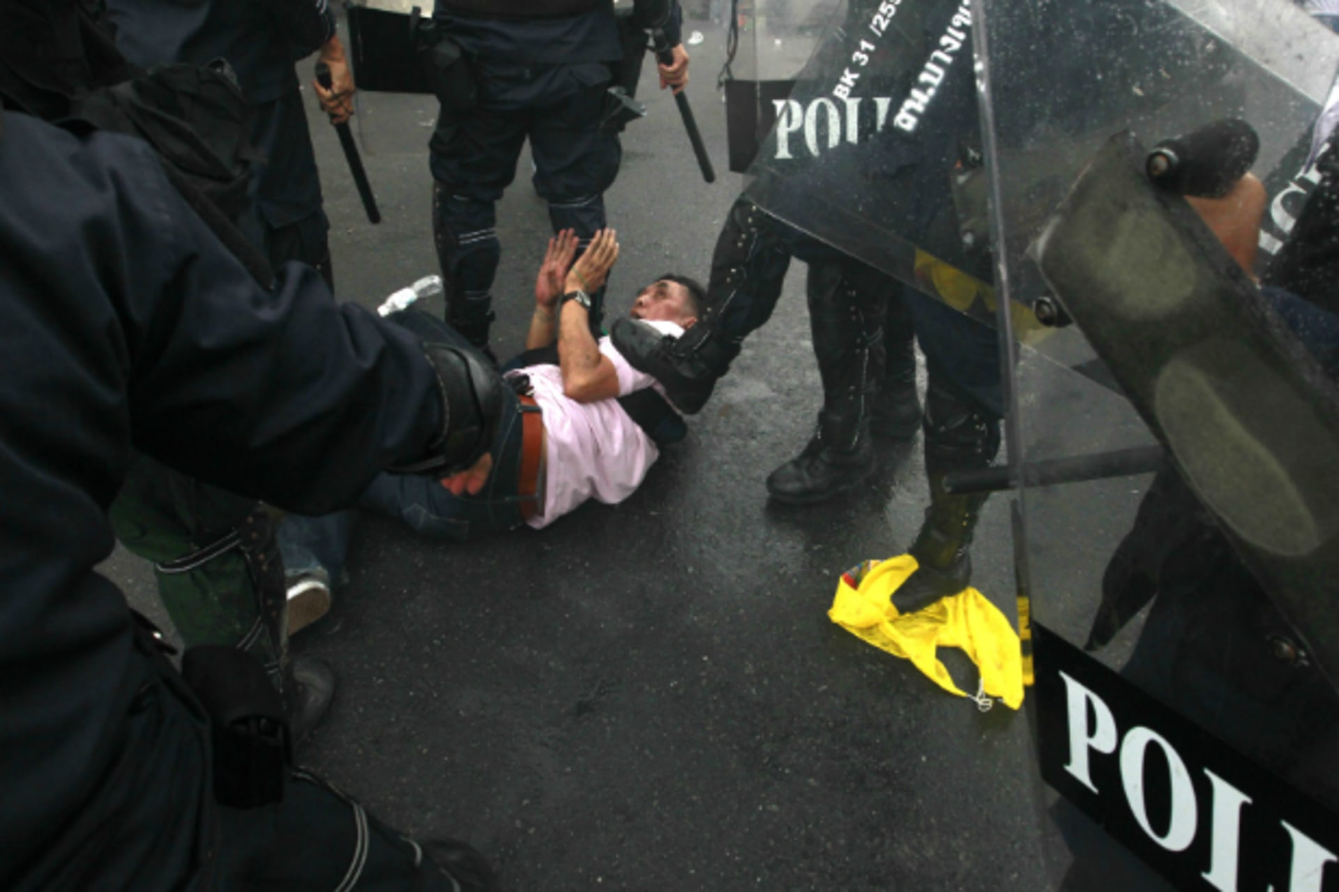 <p>Thai riot police detain an anti-government protester during a rally in Bangkok November 24, 2012. In “Democracy of Retreat?…lations and Yale University Press, Joshua Kurlantzick examines the regression of democracy in Thailand, among other countries.</p>
