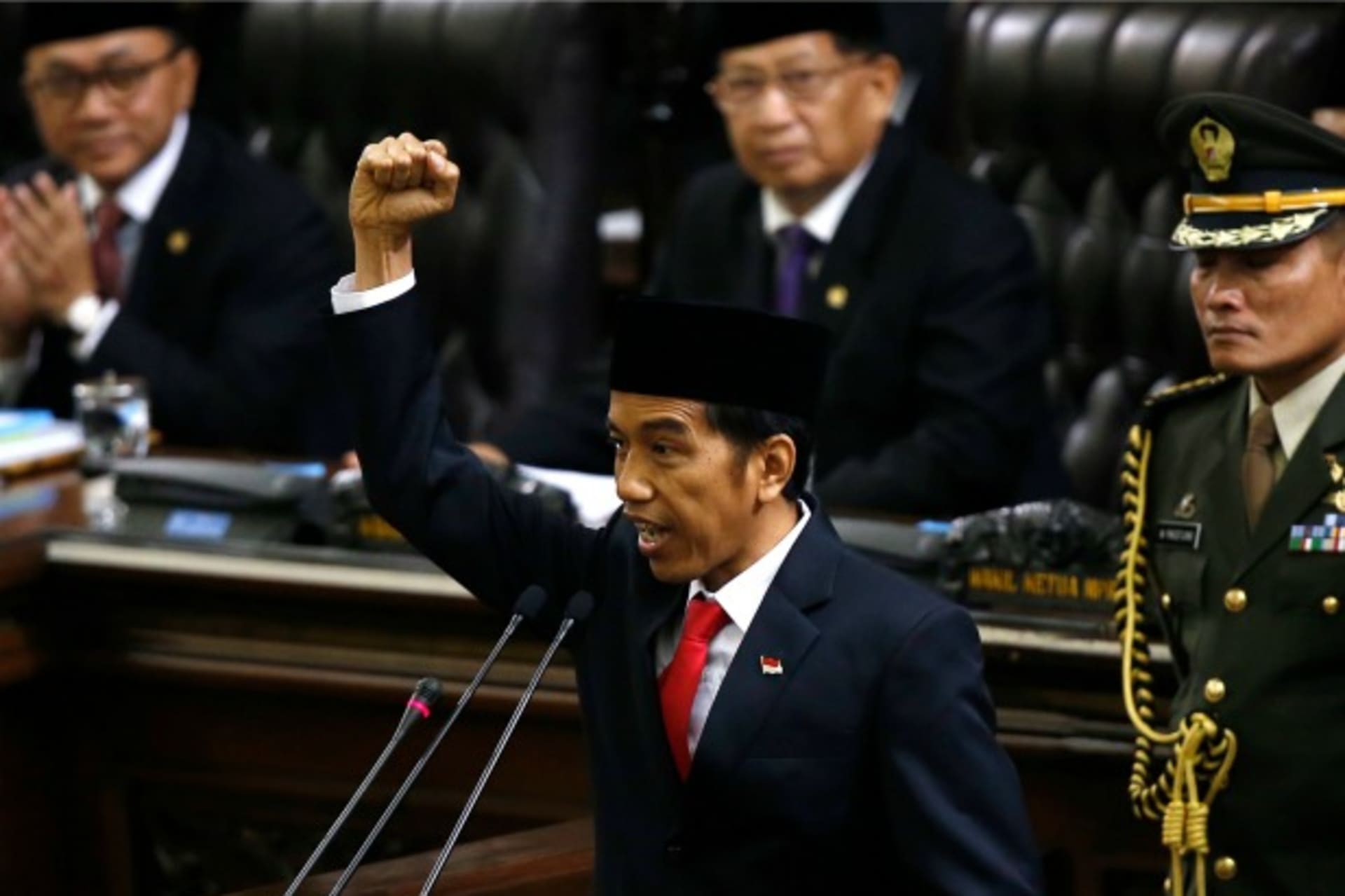 <p>Indonesia’s new President Joko Widodo shouts “Merdeka” or Freedom at the end of his speech, during his inauguration at the Hou…o test the former furniture businessman. REUTERS/Darren Whiteside (INDONESIA – Tags: POLITICS ELECTIONS TPX IMAGES OF THE DAY)</p>
