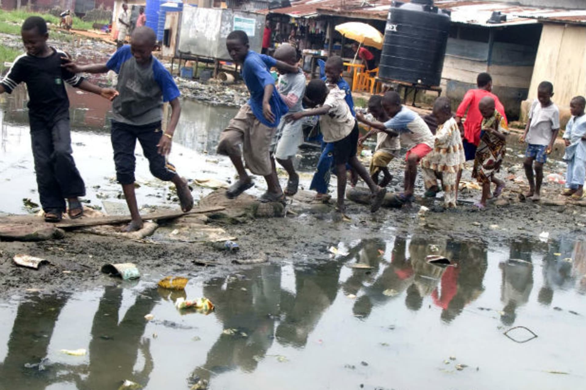 Children play at a slum in Ijegun Egba, a suburb of Nigeria's commercial capital of Lagos, July 2, 2008.