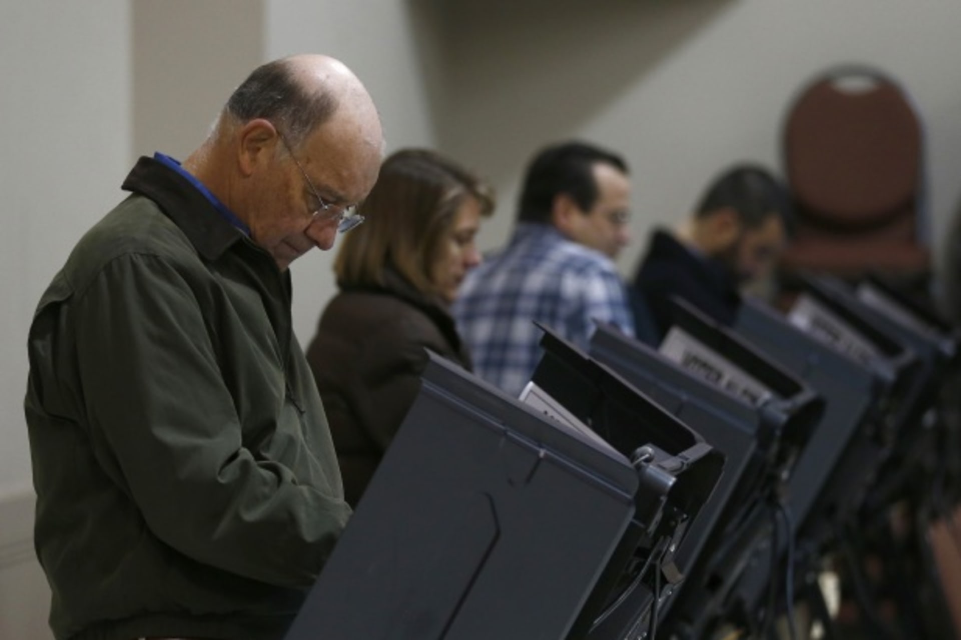 <p>Voters cast their ballots on November 6, 2012 (Chris Keane/Courtesy Reuters).</p>
