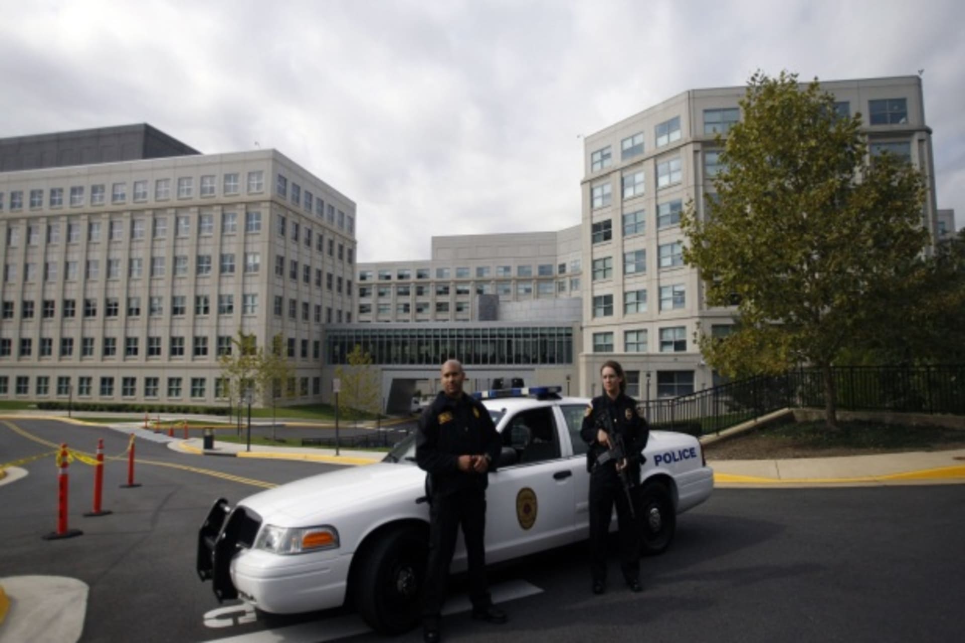 <p>Armed police guard the National Counterterrorism Center in McLean, Virginia, in October 2009 (Jason Reed/Courtesy Reuters).</p>
