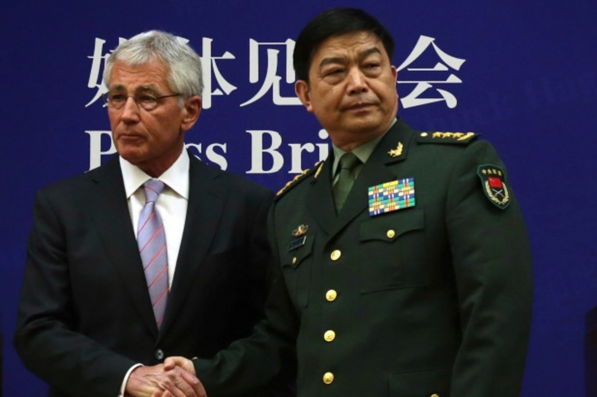 <p>U.S. Secretary of Defense Chuck Hagel (L) shakes hands with Chinese Minister of Defense Chang Wanquan at the end of a joint news conference at the Chinese Defense Ministry headquarters in Beijing on April 8, 2014. (Alex Wong/Courtesy Reuters)</p>
