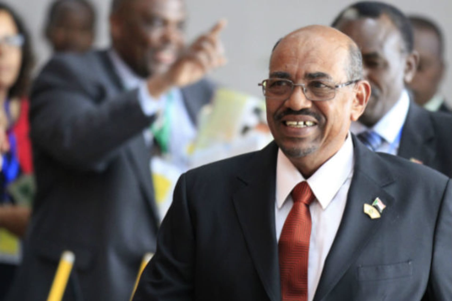 Sudan's President Omar al-Bashir arrives for the extraordinary session of the African Union's Assembly of Heads of State and Government on the case of African Relationship with the International Criminal Court (ICC) in Ethiopia's capital Addis