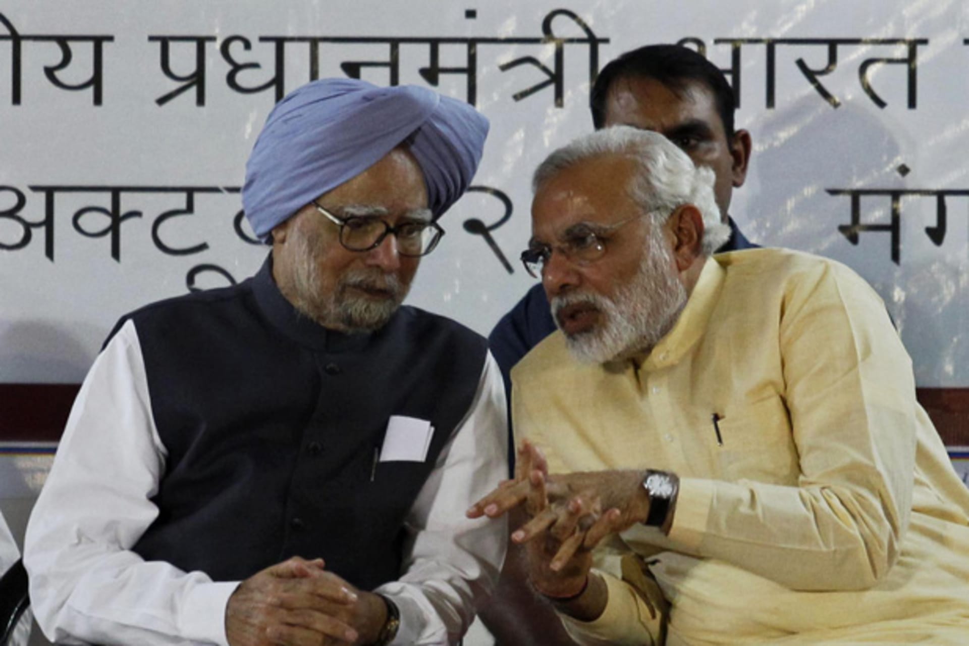 <p>Indian Prime Minister Manmohan Singh (L) speaks with Gujarat’s chief minister and Hindu nationalist Narendra Modi, the prime m…ardar Vallabhbhai Patel national museum in the western Indian city of Ahmedabad October 29, 2013 (Amit Dave/Courtesy Reuters).</p>
