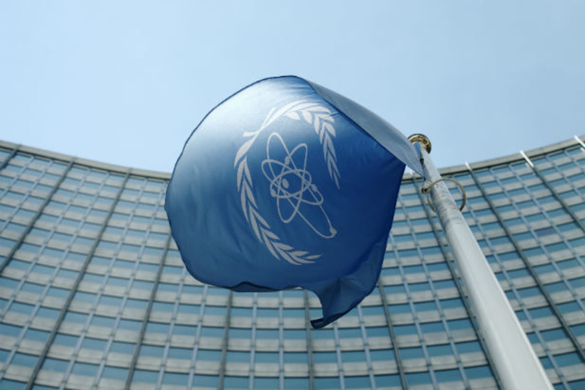 <p>The flag of the International Atomic Energy Agency (IAEA) flies in front of its headquarters in Vienna, Austria, on May 28, 2015.</p>
