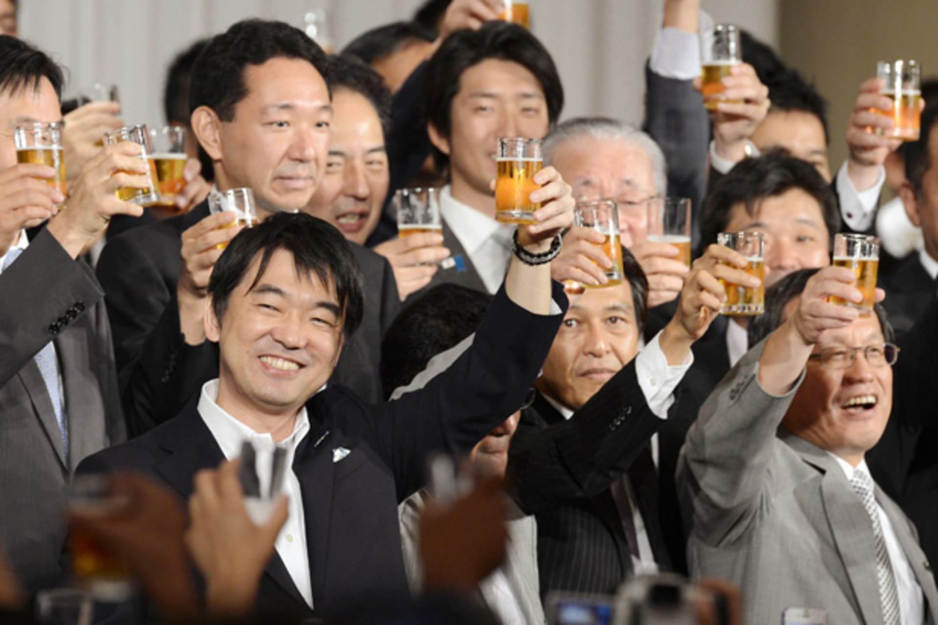 <p>Osaka Mayor Toru Hashimoto toasts with members of his new Japan Restoration Party at a fund-raising party in this photo taken by Kyodo in Osaka</p>