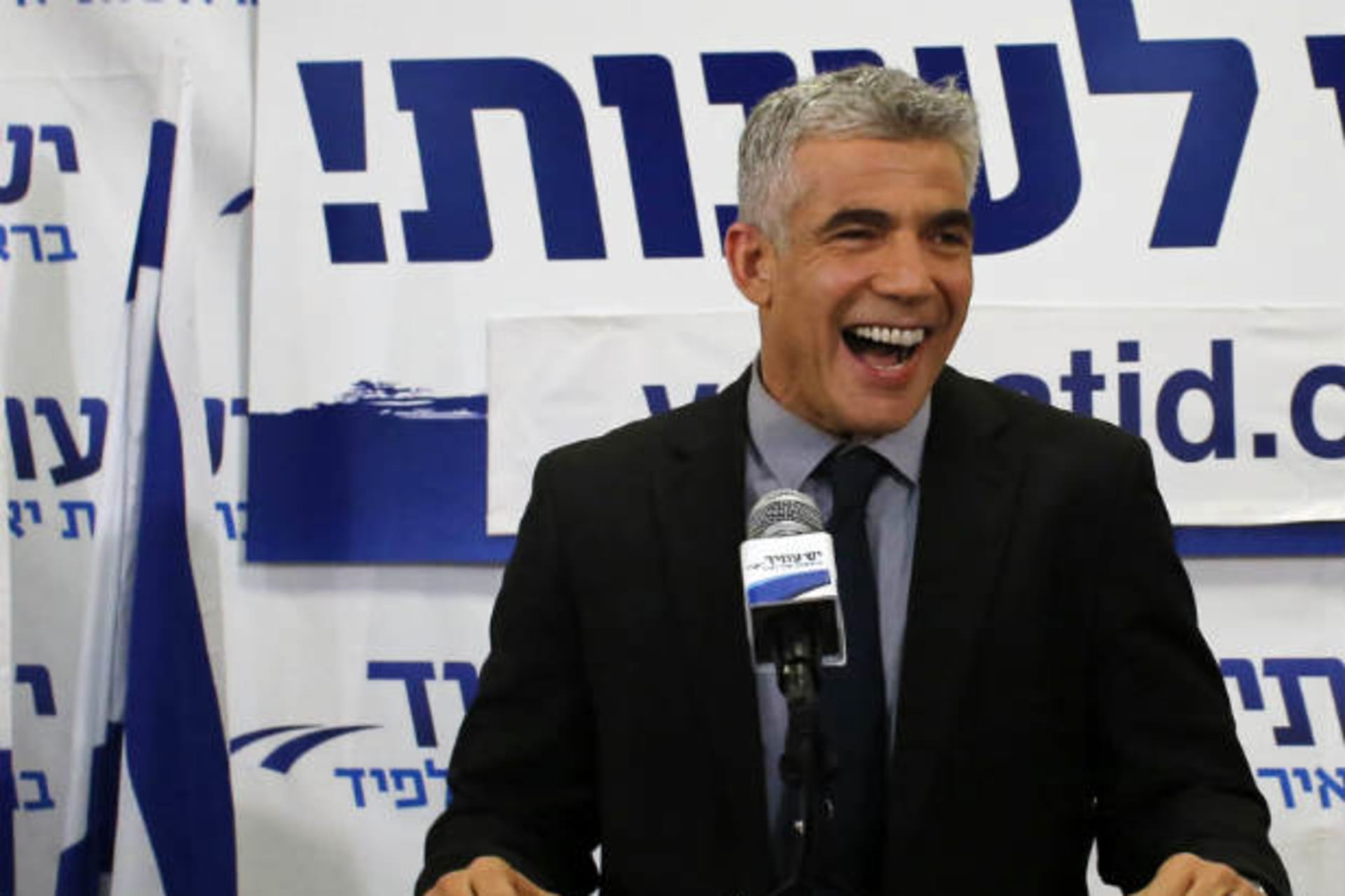 Yair Lapid, leader of the Yesh Atid party, addresses supporters in Tel Aviv after his party exceeded expectations in Israel's national election on January 22, 2013 (Awad/Courtesy Reuters).