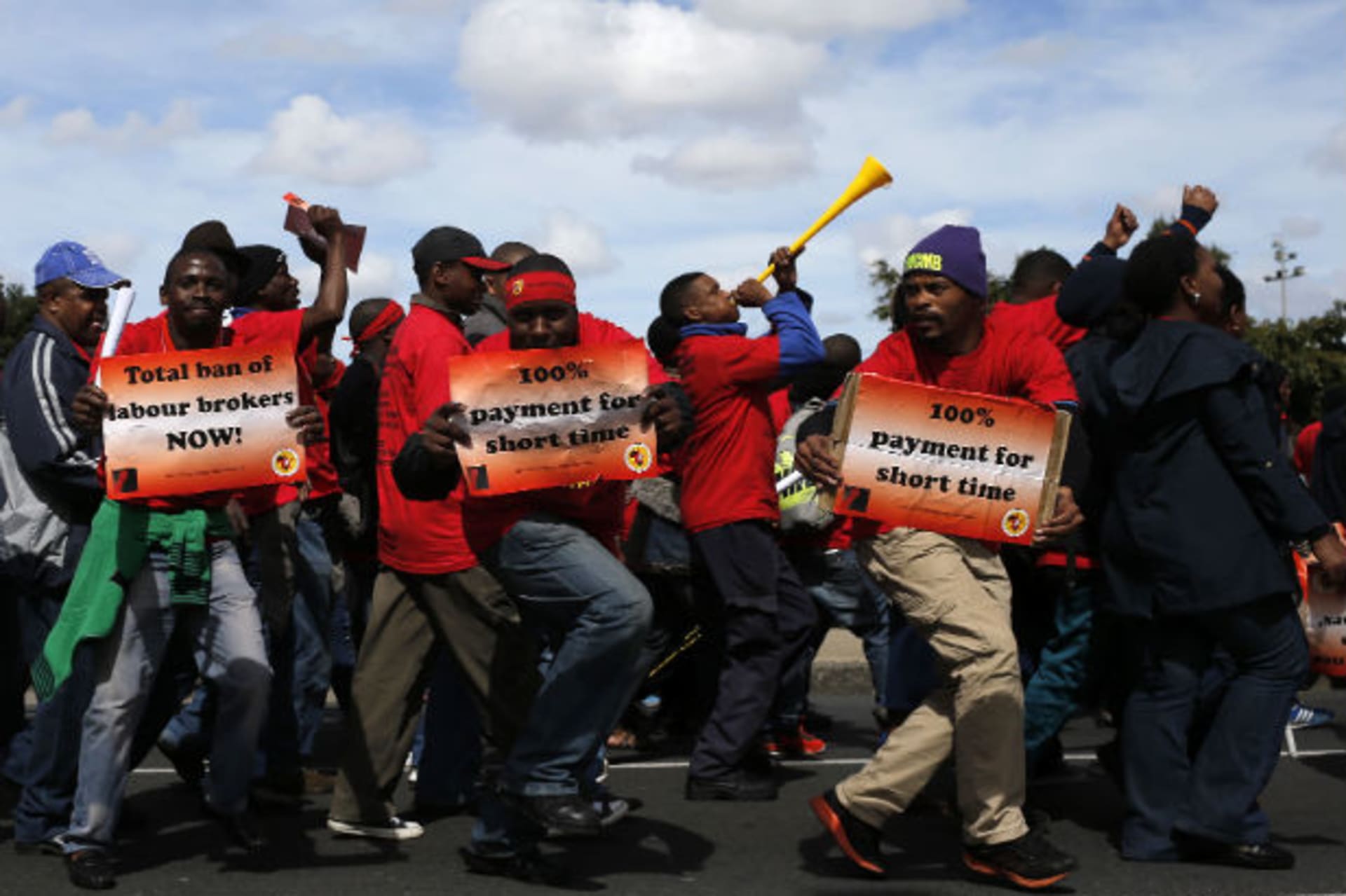 Members of the National Union of Metalworkers of South Africa (NUMSA) march during a strike in Cape Town September 9, 2013.