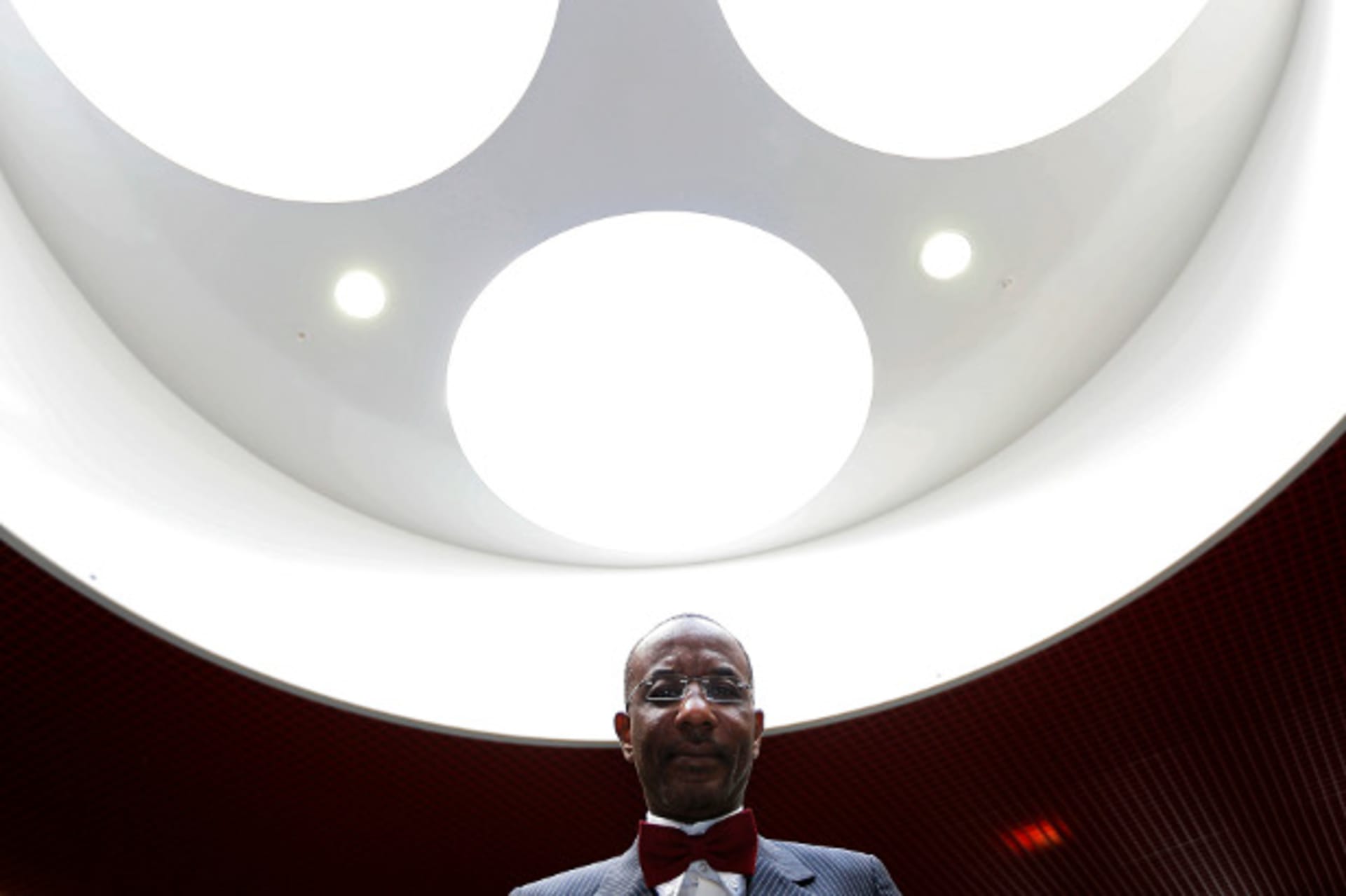 Nigeria's central bank governor Sanusi Lamido Sanusi poses for a photo after an interview with Reuters at the World Islamic Economic Forum in London October 30, 2013.