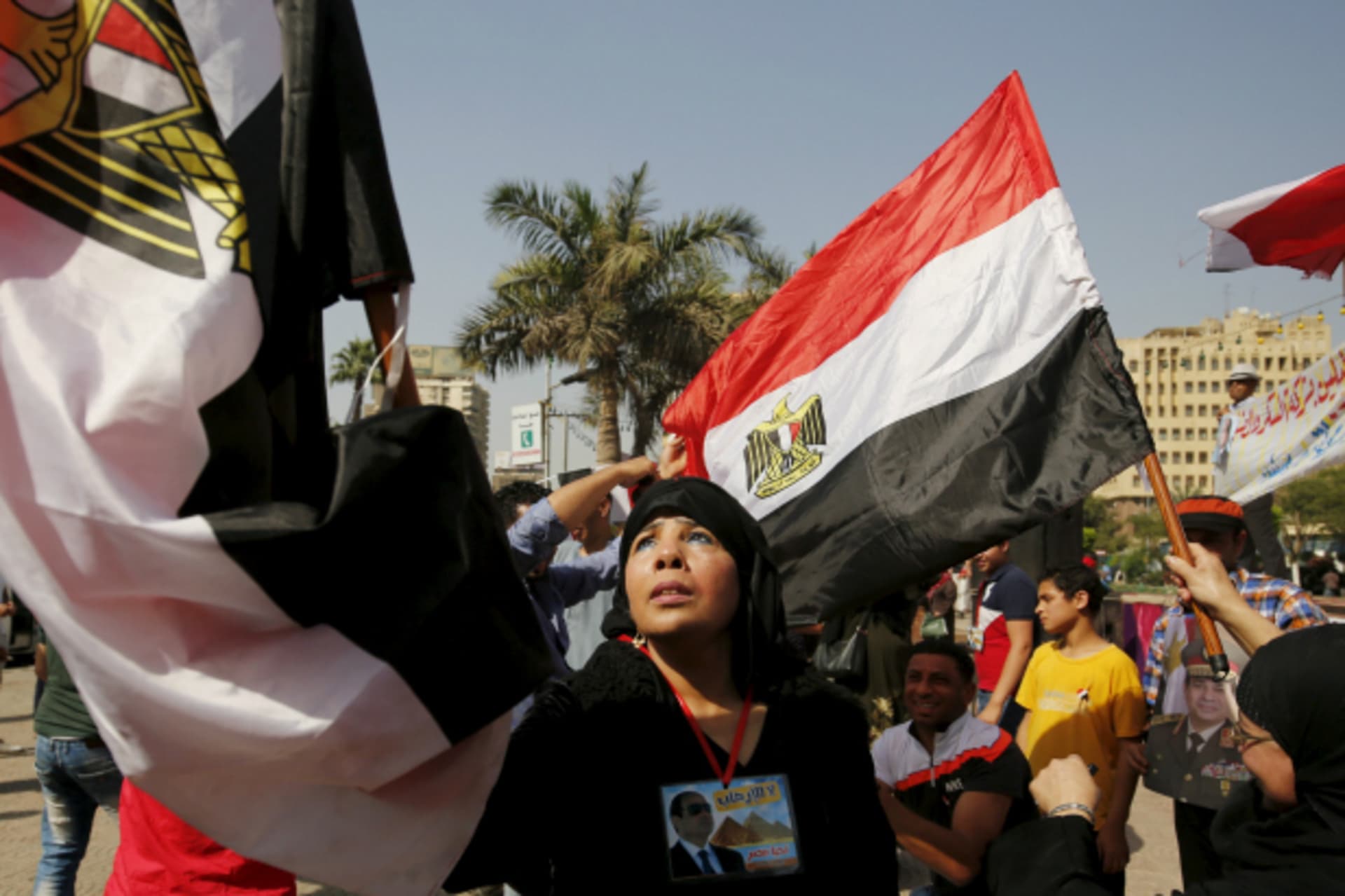 <p>Supporters of Egypt’s army and Egyptian President Abdel Fattah al-Sisi dance and cheer as they celebrate the anniversary of Sinai Liberation Day in Cairo, Egypt (Amr Abdallah Dalsh/Reuters).</p>
