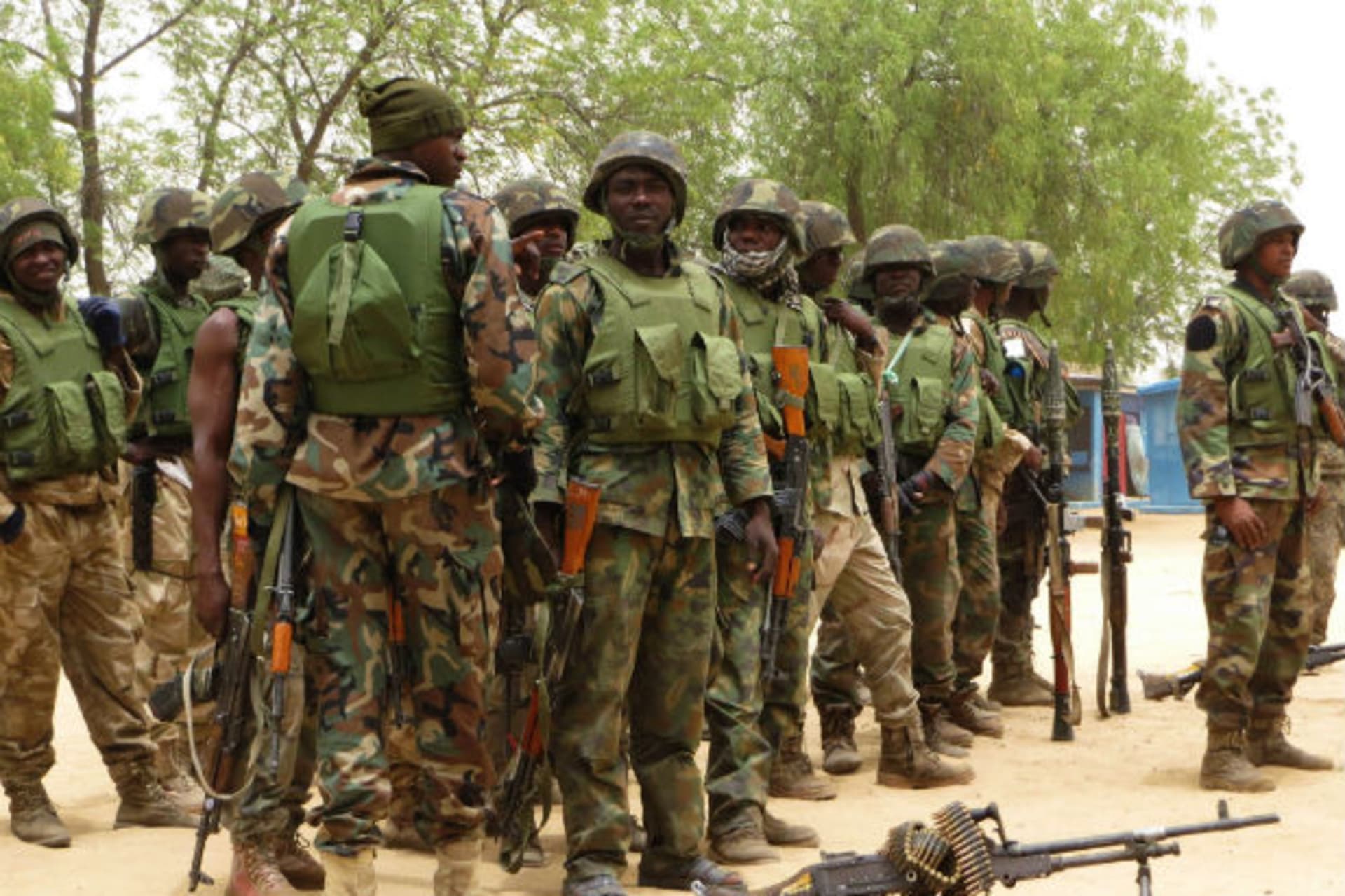 Soldiers stand during a parade in Baga village on the outskirts of Maiduguri, in the north-eastern state of Borno May 13, 2013.
