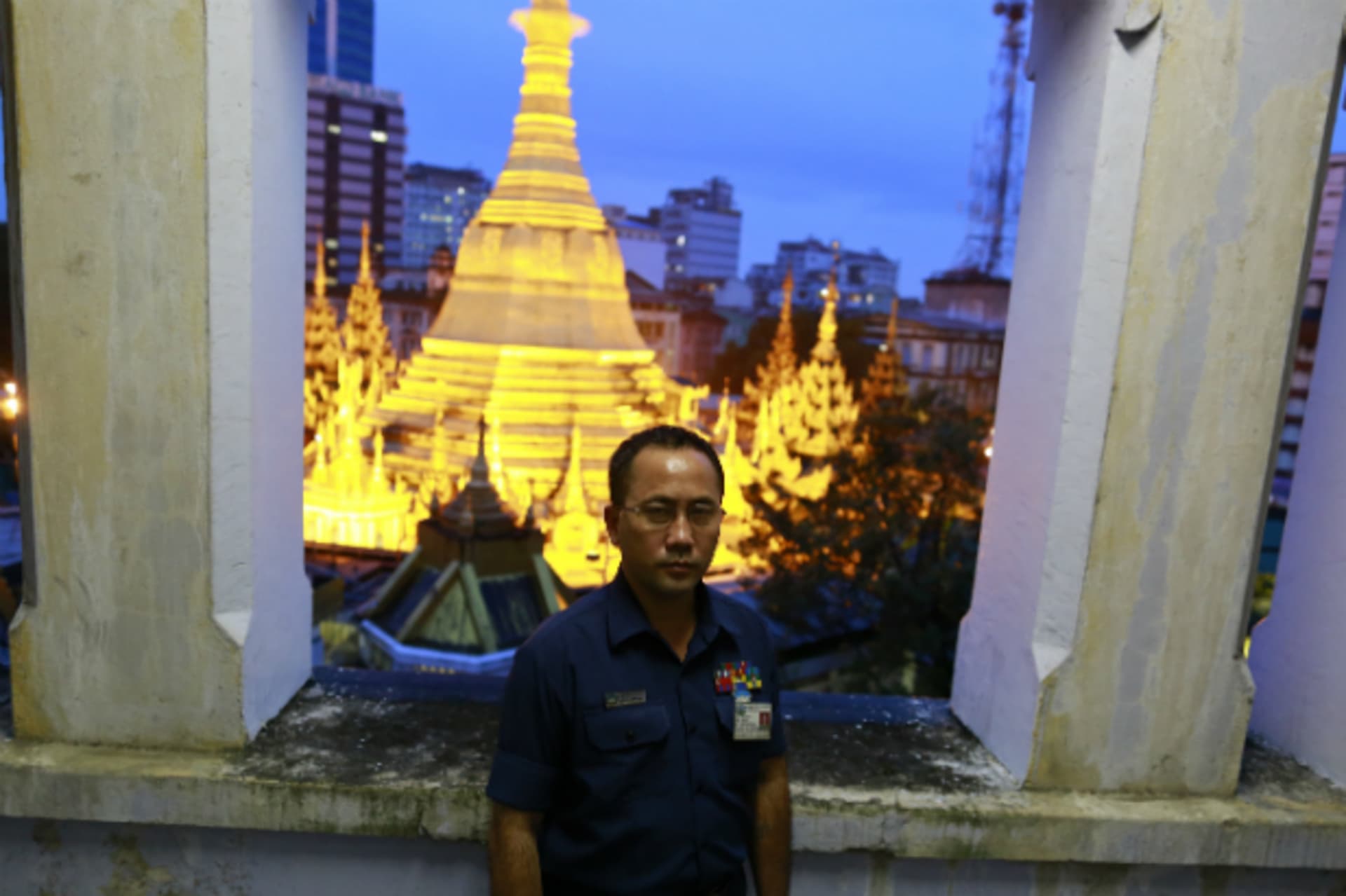 <p>Toe Aung, deputy head of urban planning, poses for a photo at the Yangon City hall, with the lit Sule Pagoda seen behind him, …on’s unstoppable transformation from a regional backwater into Southeast Asia’s next megacity. (Soe Zeya Tun/Courtesy Reuters)</p>
