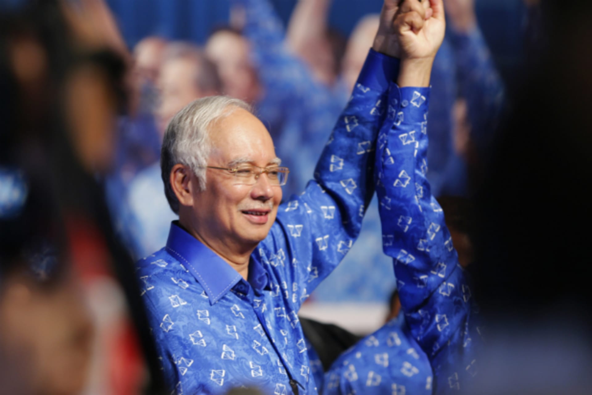 <p>Malaysia’s Prime Minister Najib Razak celebrates with his other party leaders after winning the elections at his party headquarters in Kuala Lumpur on May 6, 2013. (Bazuki Muhammad/Courtesy Reuters)</p>