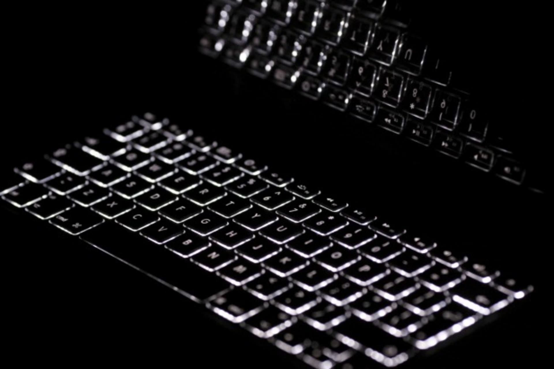 <p>Backlit keyboard is reflected in screen of Apple Macbook Pro notebook computer in Warsaw on February 6, 2012. (Kacper Pempel/Courtesy Reuters)</p>
