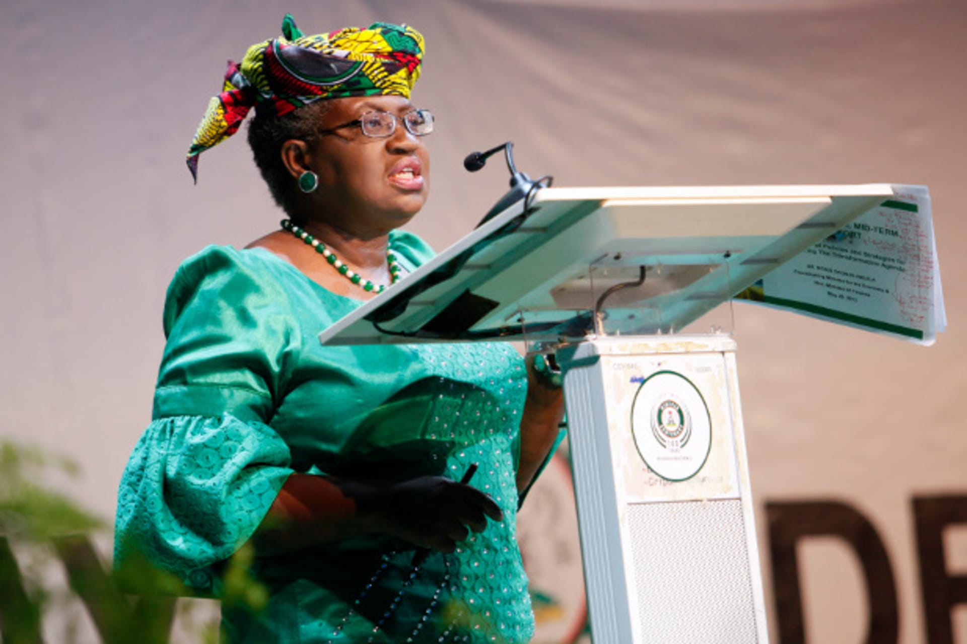 Nigeria's Finance Minister Ngozi Okonjo-Iweala address the audience on the achievements of President Goodluck Jonathan's administration while delivering the mid-term report during Democracy Day celebrations in Abuja May 29, 2013.