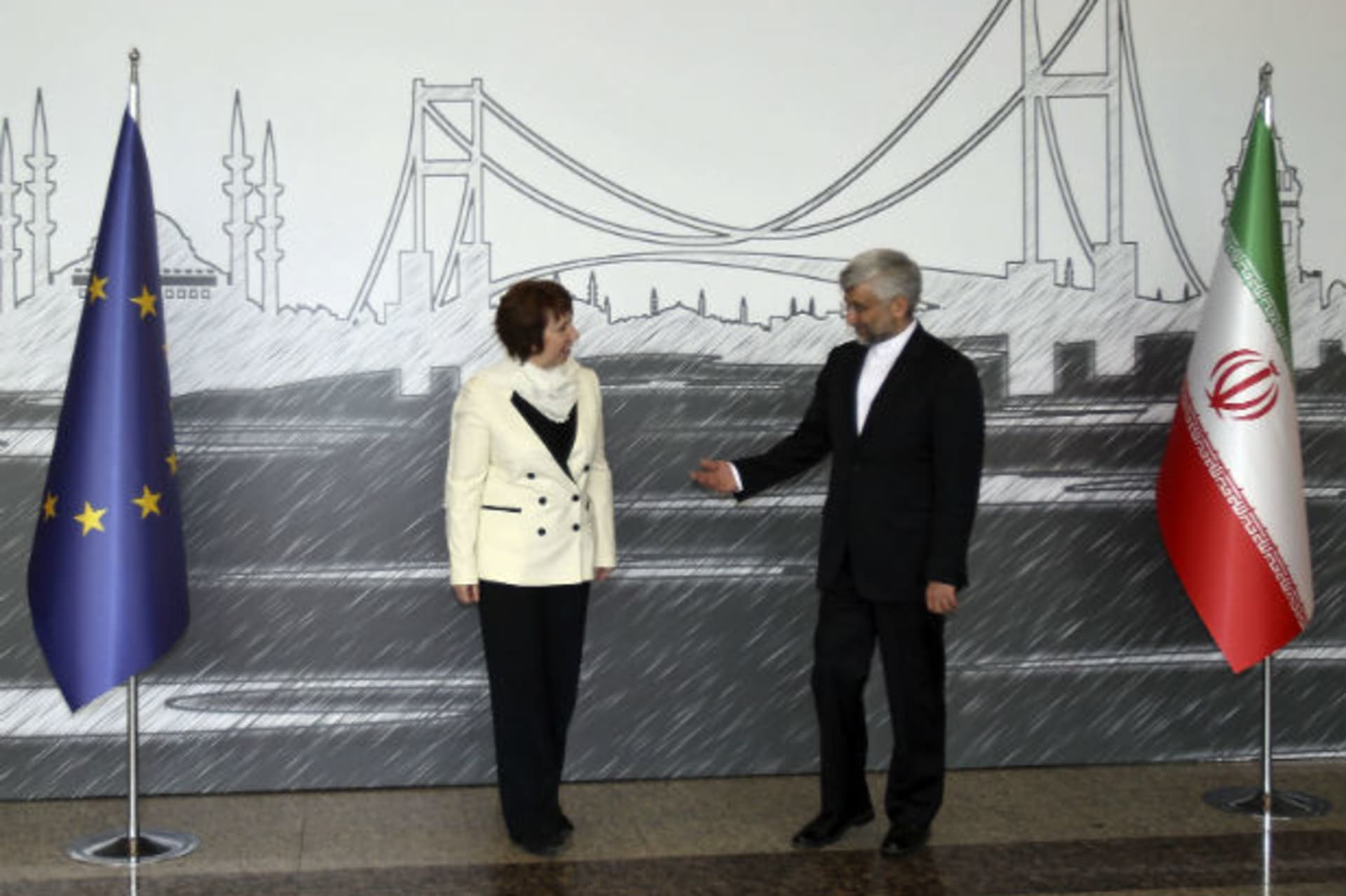 European Union foreign policy chief Catherine Ashton and Iran's chief negotiator Saeed Jalili pose for media before their meeting in Istanbul on April 14, 2012 (Tolga Adanali/Courtesy Reuters).