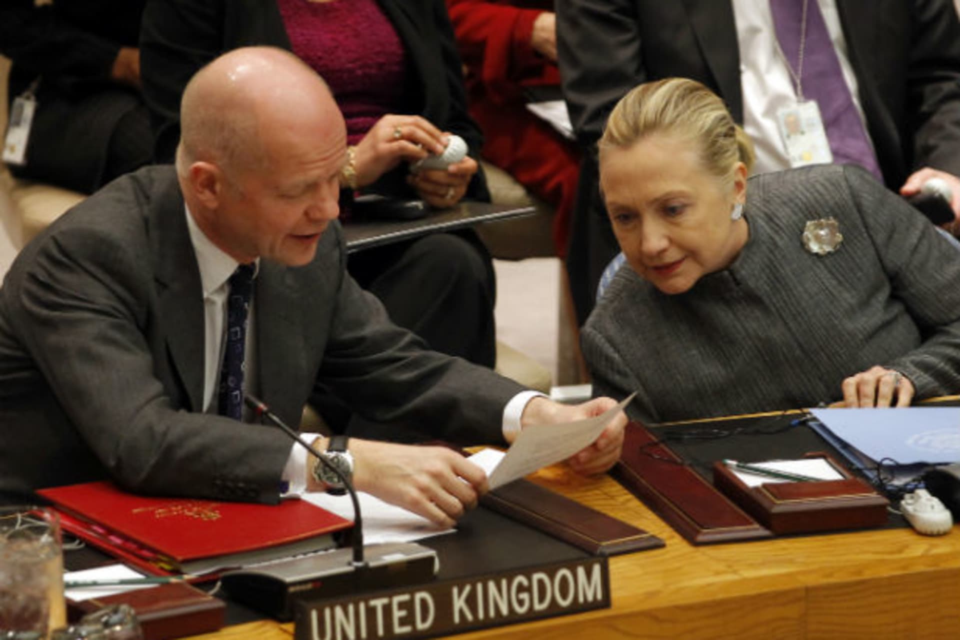 U.S. secretary of state Hillary Clinton confers with British foreign minister William Hague before a UN Security Council meeting at the United Nations in New York on January 31, 2012 (Mike Segar/Courtesy Reuters).