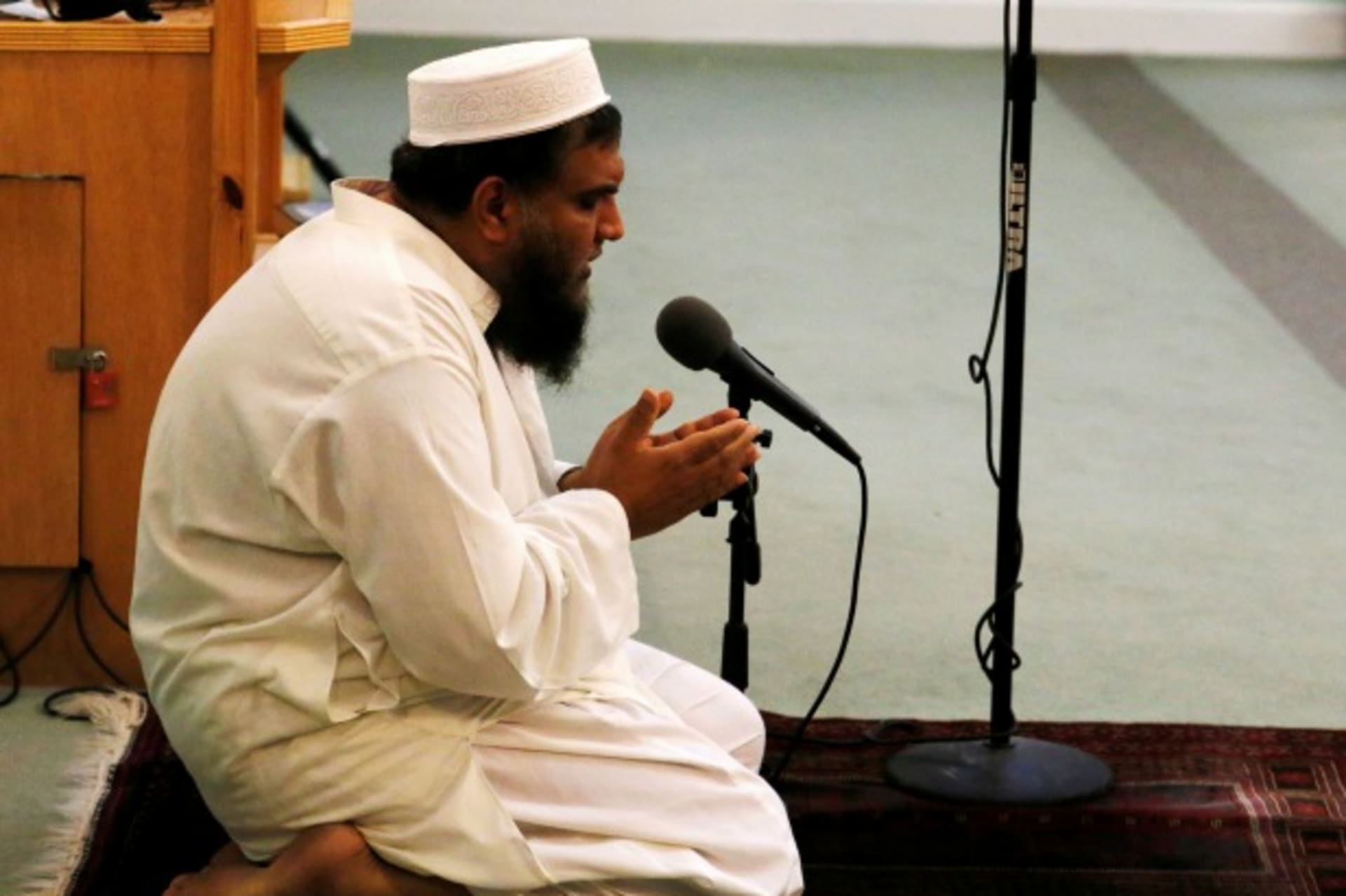 <p>Imam Syed Shafeeq Rahman of the Islamic Center of Fort Pierce offers a prayer for victims of the Orlando shooting, in Fort Pierce, Florida on June 12, 2016. (Joe Skipper/Reuters)</p>
