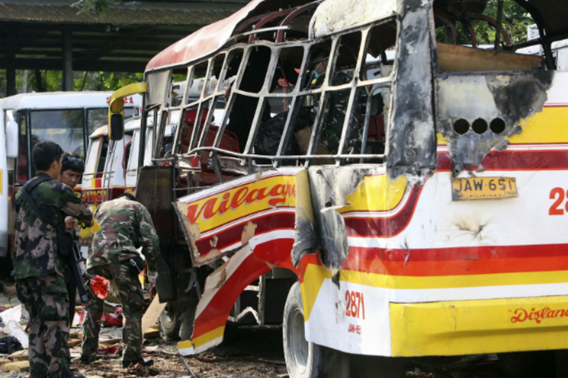<p>Police and military bomb experts search for fragments and residue after a bomb exploded and ripped through a passenger bus, ki…at has already killed more than a hundred and left scores of others wounded, local media reported. (Stringer/Courtesy Reuters)</p>
