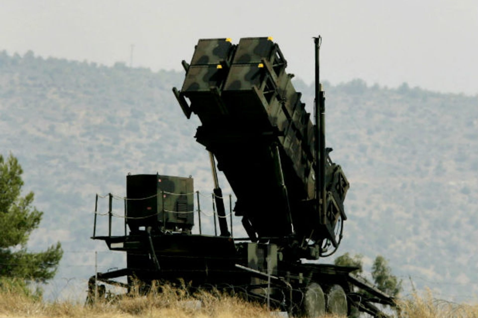 A Patriot missile battery is seen from the canoeing venue at the Athens OIympics (Jason Reed/Courtesy Reuters)