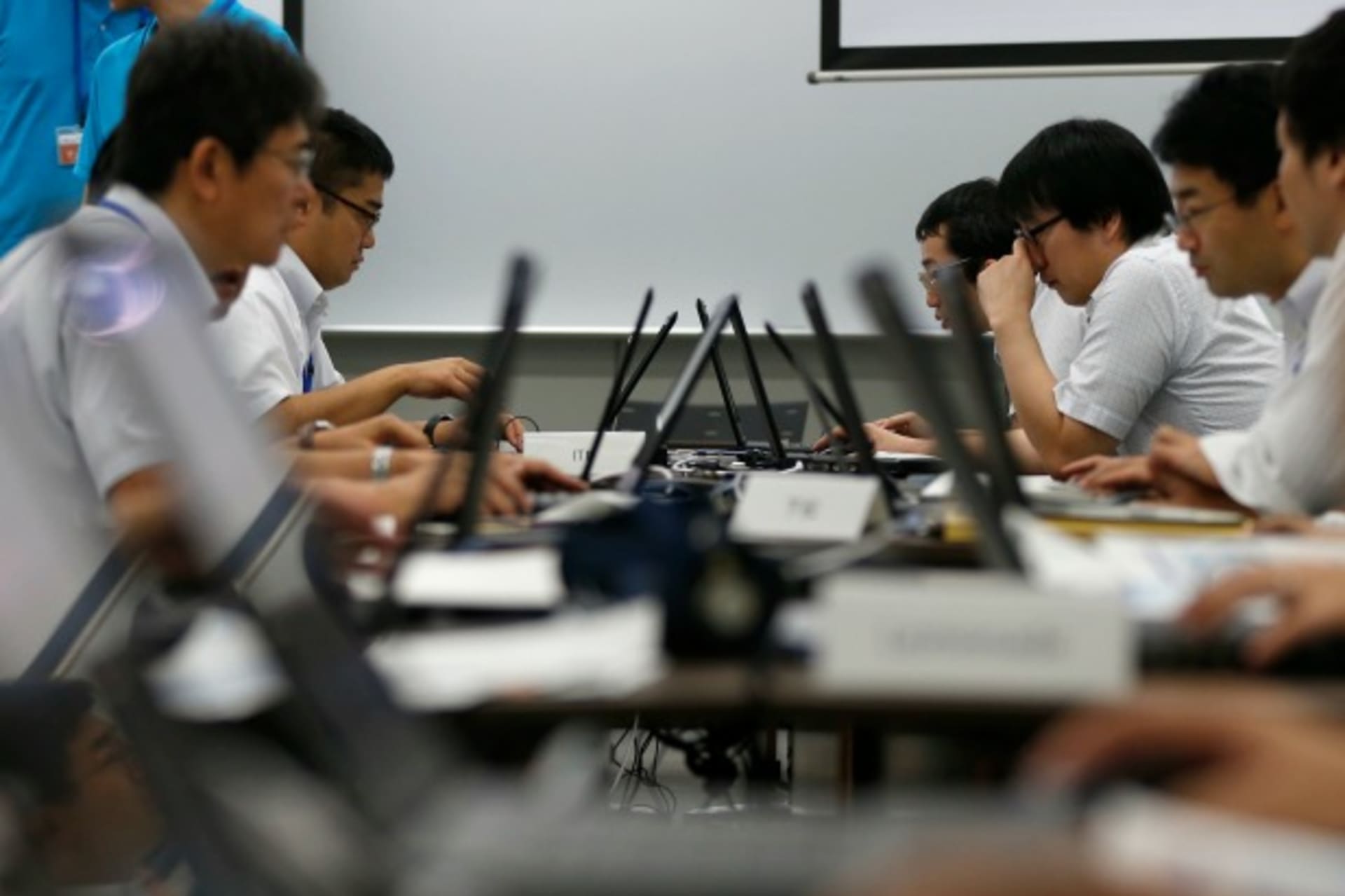 <p>Participants from government ministries and agencies take part in the Cyber Defense Exercise with Recurrence (CYDER) in Tokyo on September 25, 2013. (Toru Hanai/Courtesy Reuters)</p>
