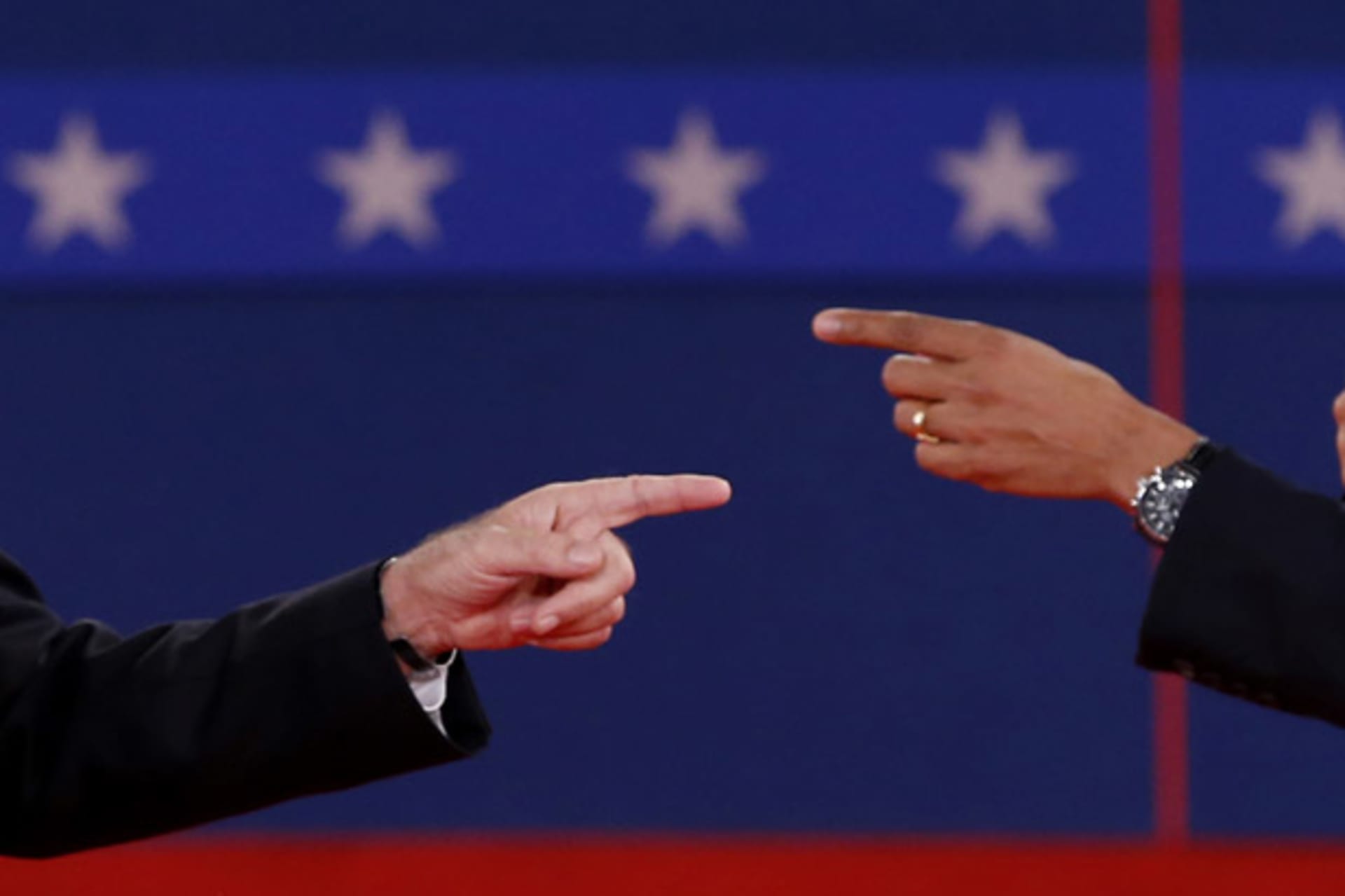 <p>Mitt Romney and Barack Obama point fingers during the second presidential debate. (Mike Segar/ courtesy Reuters)</p>
