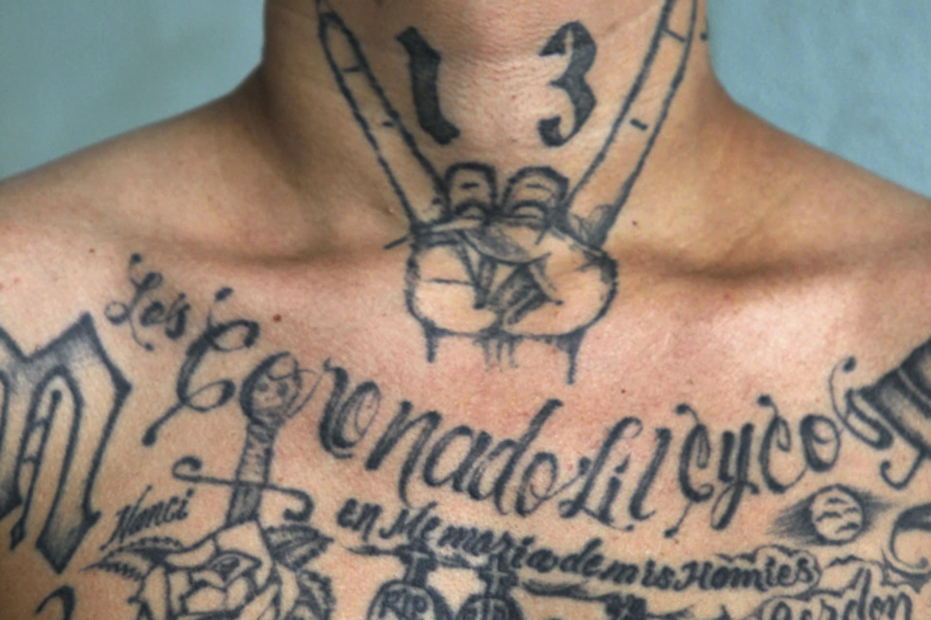 "El Recio", a former leader of the Mara Salvatrucha or M -13 gang, poses during a photo session at Comayagua jail in Honduras